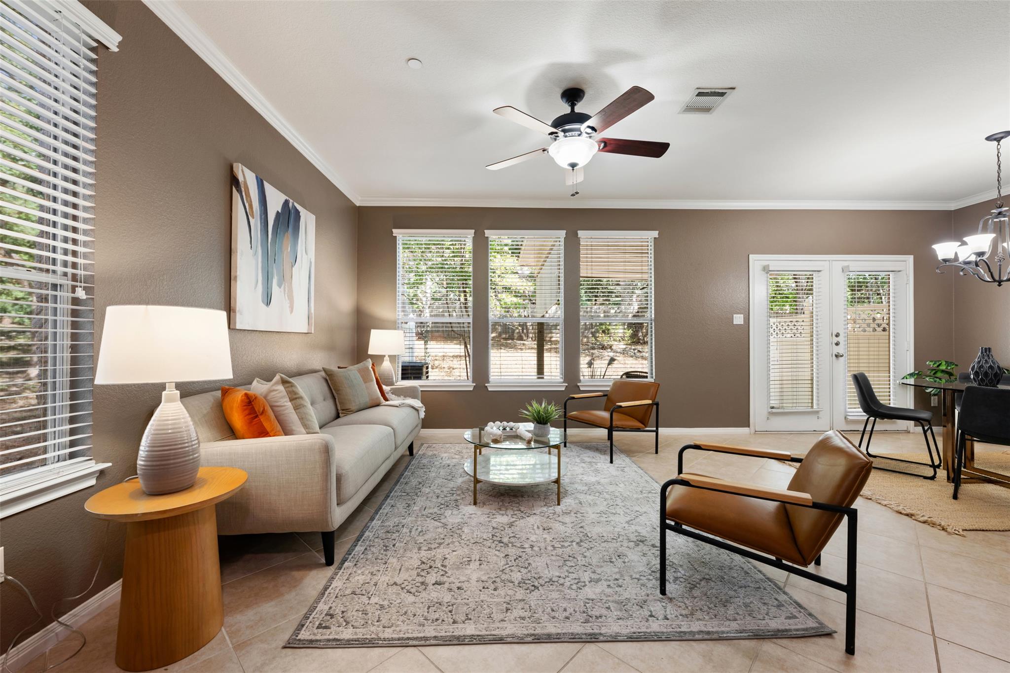 Crown molding frames the open-concept living area