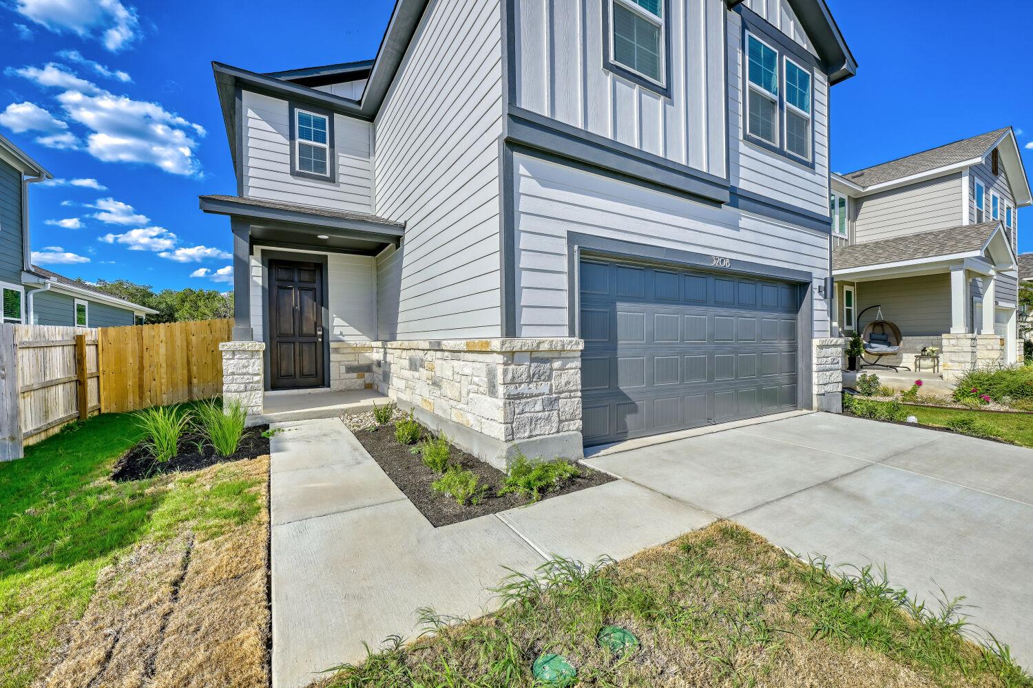 Crisp paneling and rustic stone veneer accent the