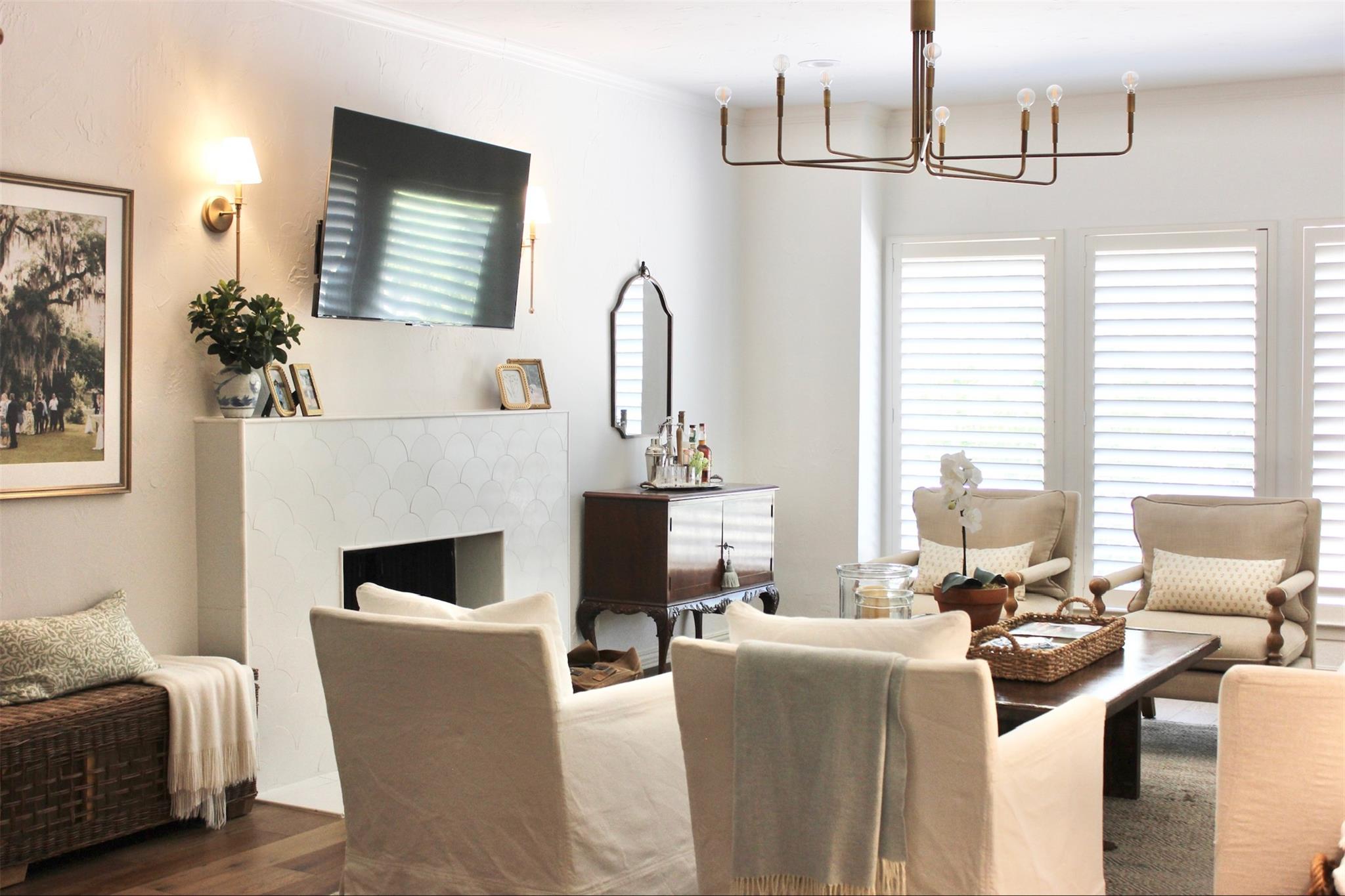 A classic fireplace anchors this inviting living 