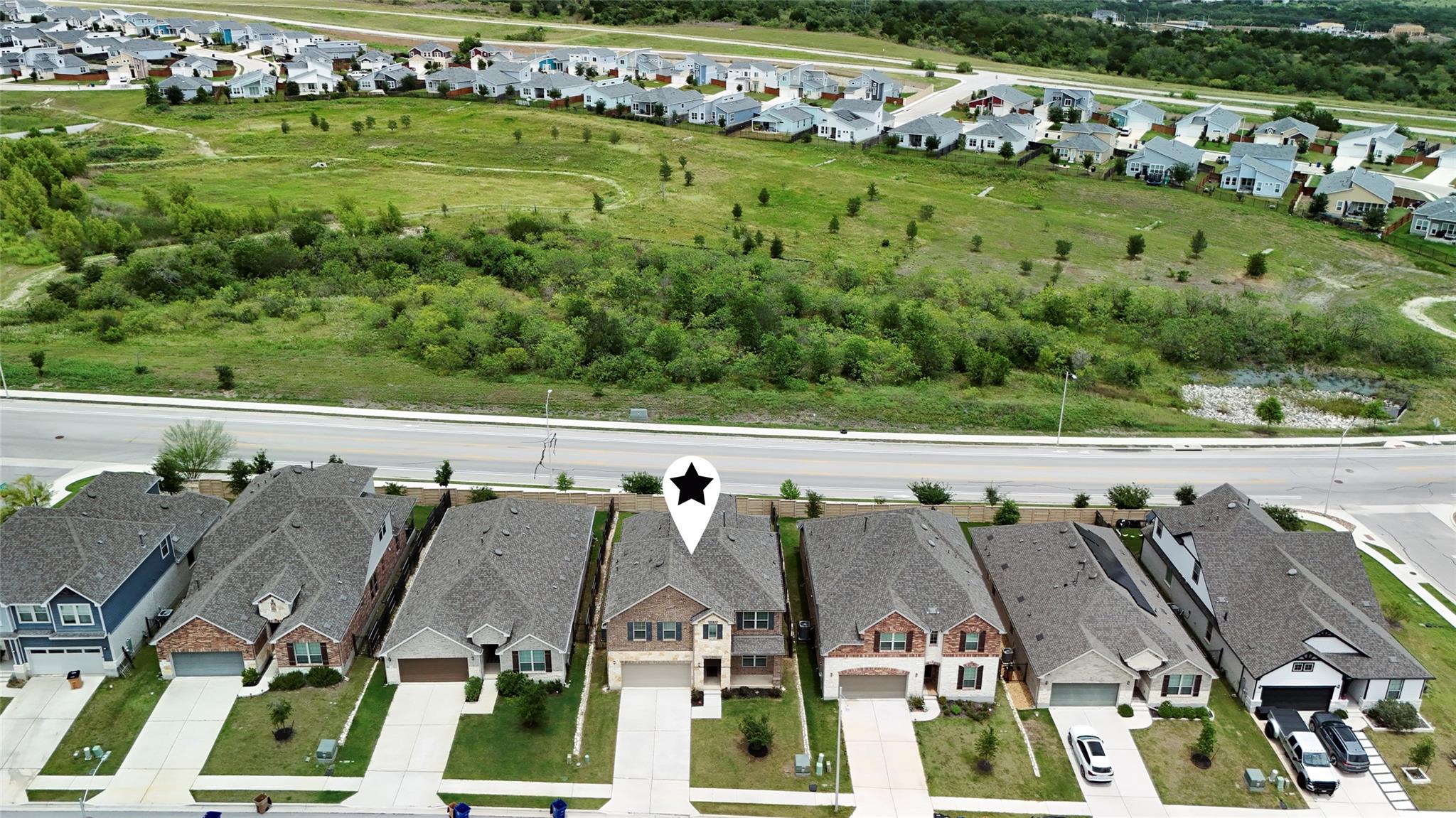 An aerial perspective showcases the home situated