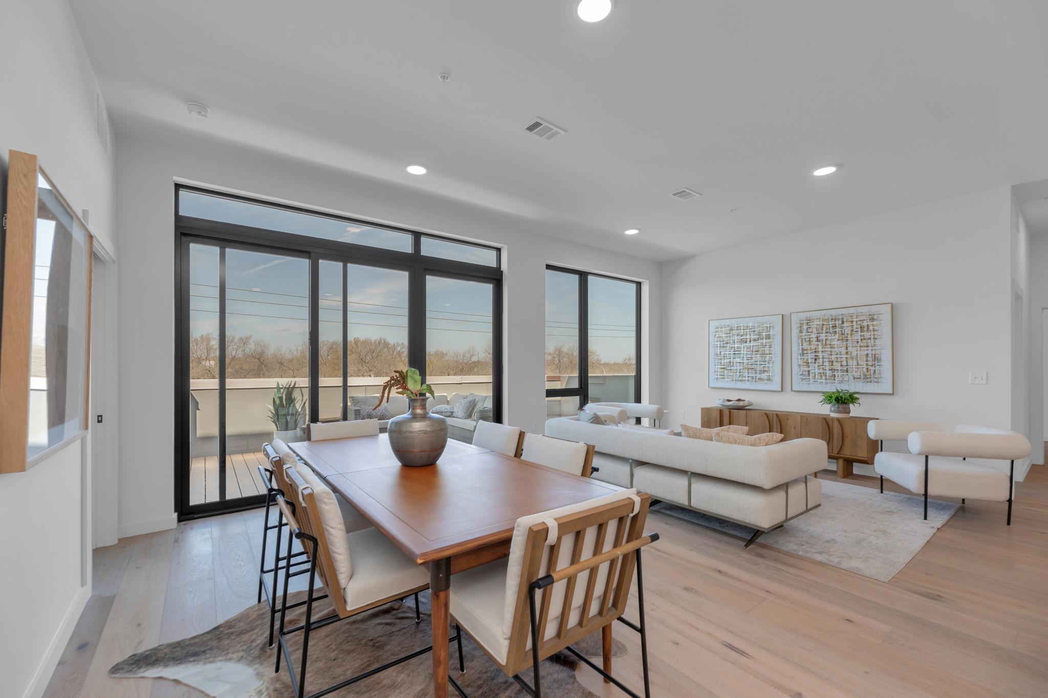 Gleaming wood floors and recessed lighting enhanc