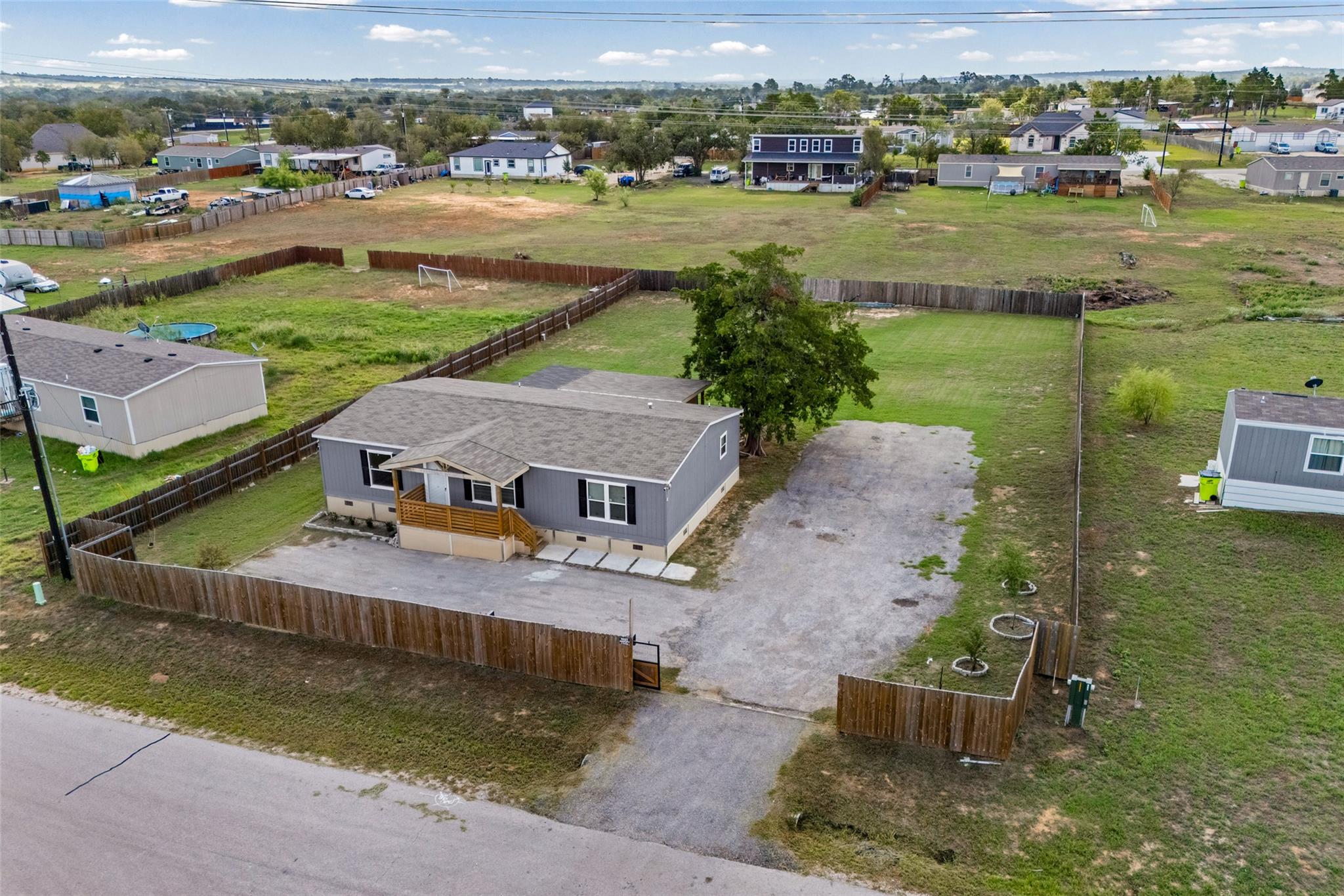 A spacious fully fenced yard surrounds this home 