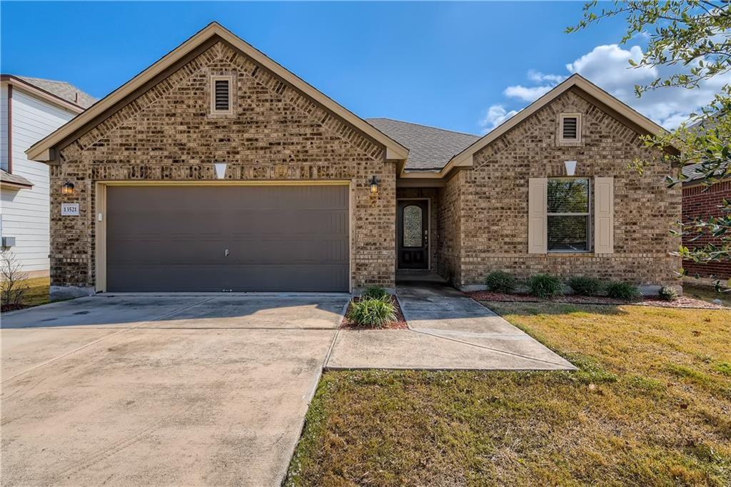 Classic brick architecture defines this inviting 