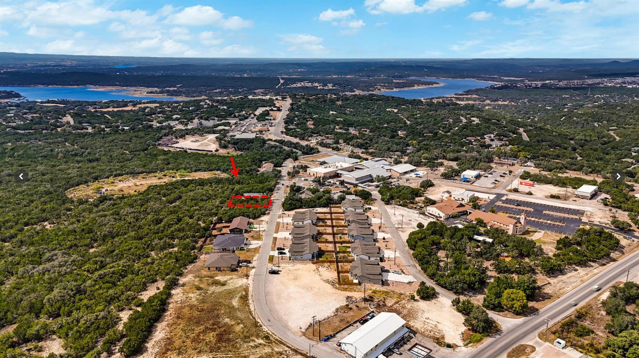 Panoramic neighborhood views stretch across rolli