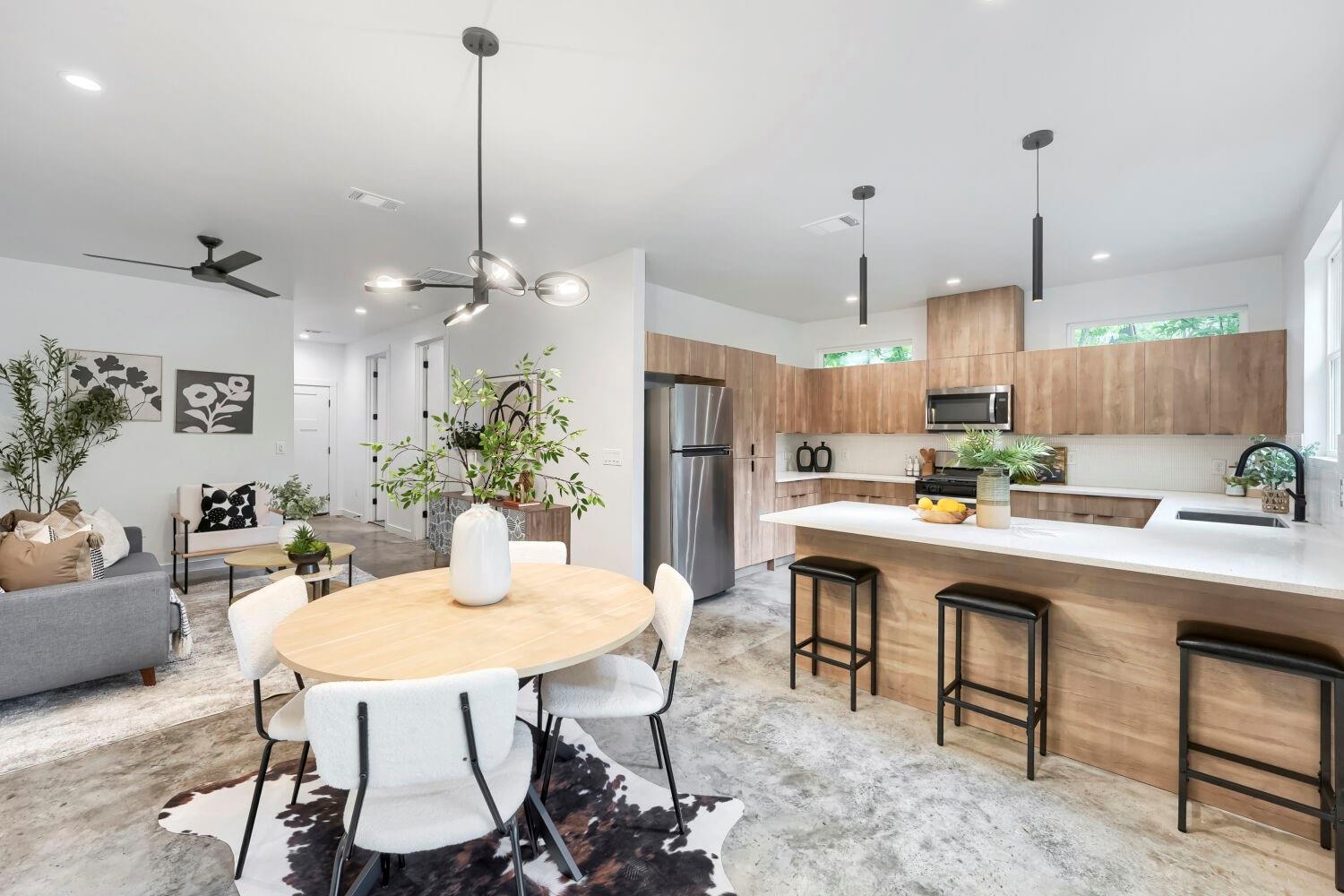 Polished concrete floors anchor a light-filled op