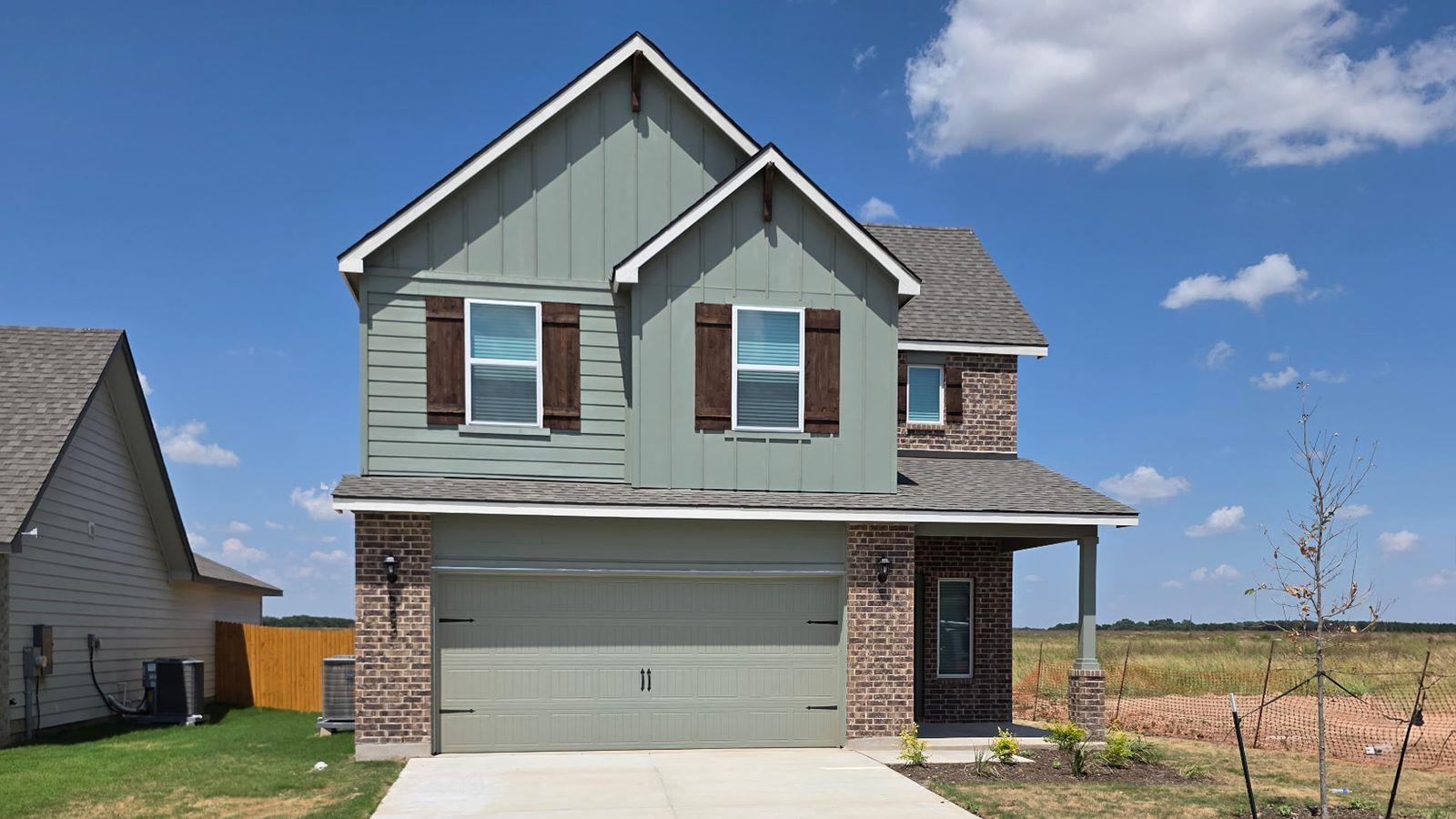 Board and batten siding pairs with classic brickw