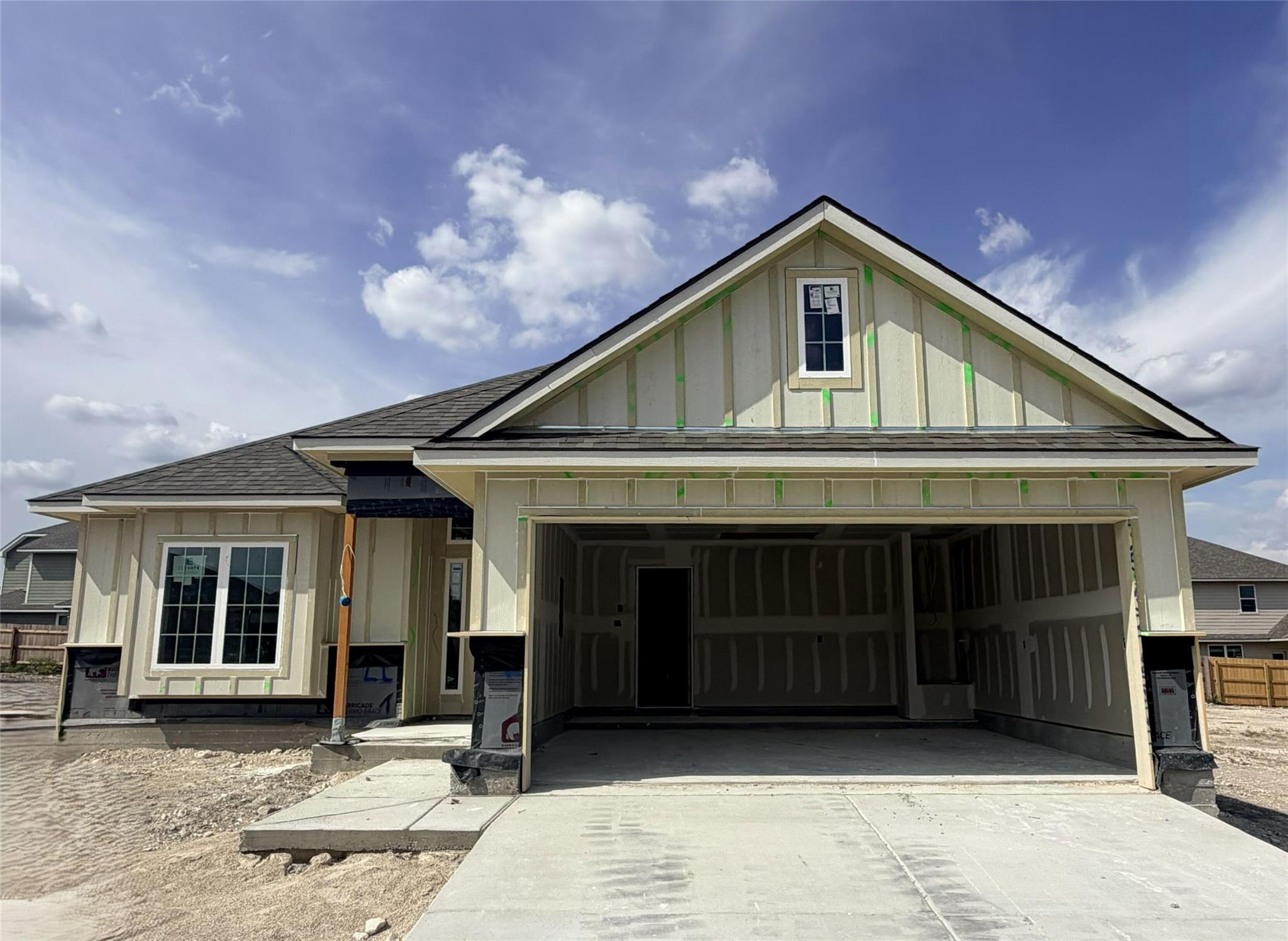 Board and batten siding pairs with a shingle roof