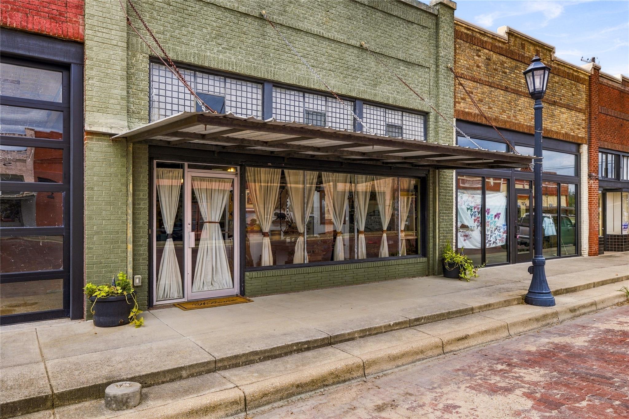 Classic brick storefront offers excellent curb ap