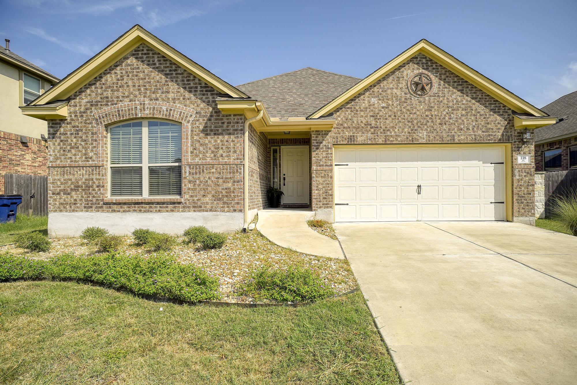 Classic brick craftsmanship defines this inviting