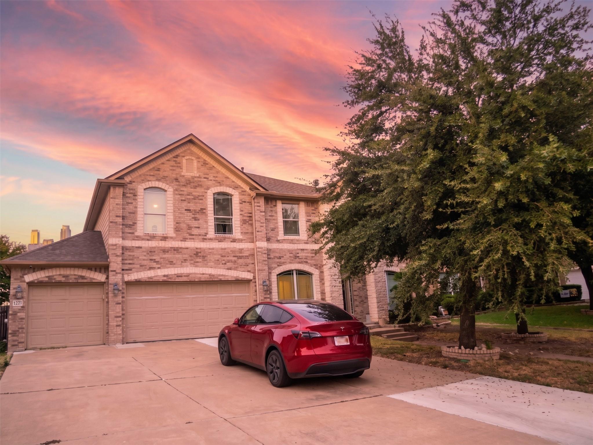 Classic brick exterior accents define this two-st