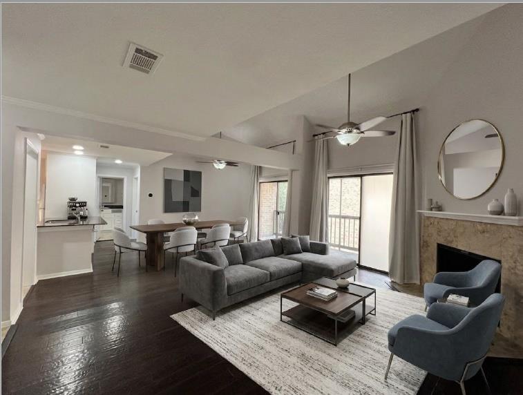 Vaulted ceilings and rich wood floors anchor this