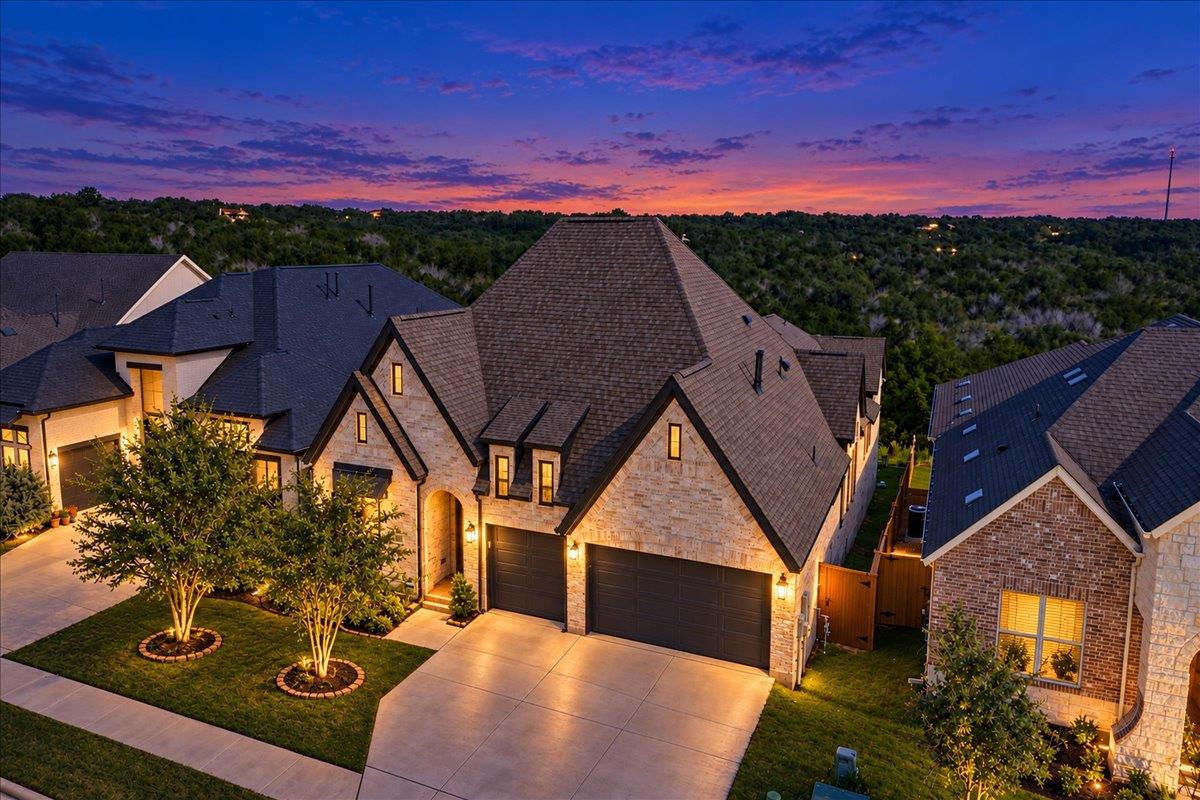 Striking stone masonry and complex rooflines anch