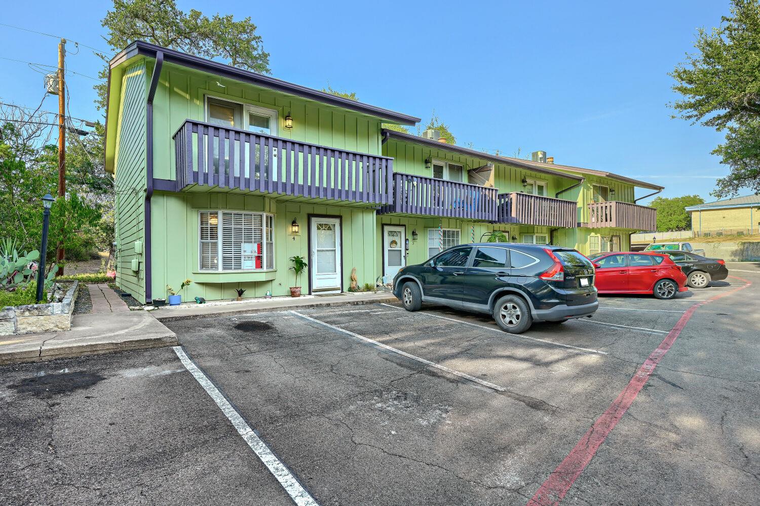 Multi-level residential units present private bal