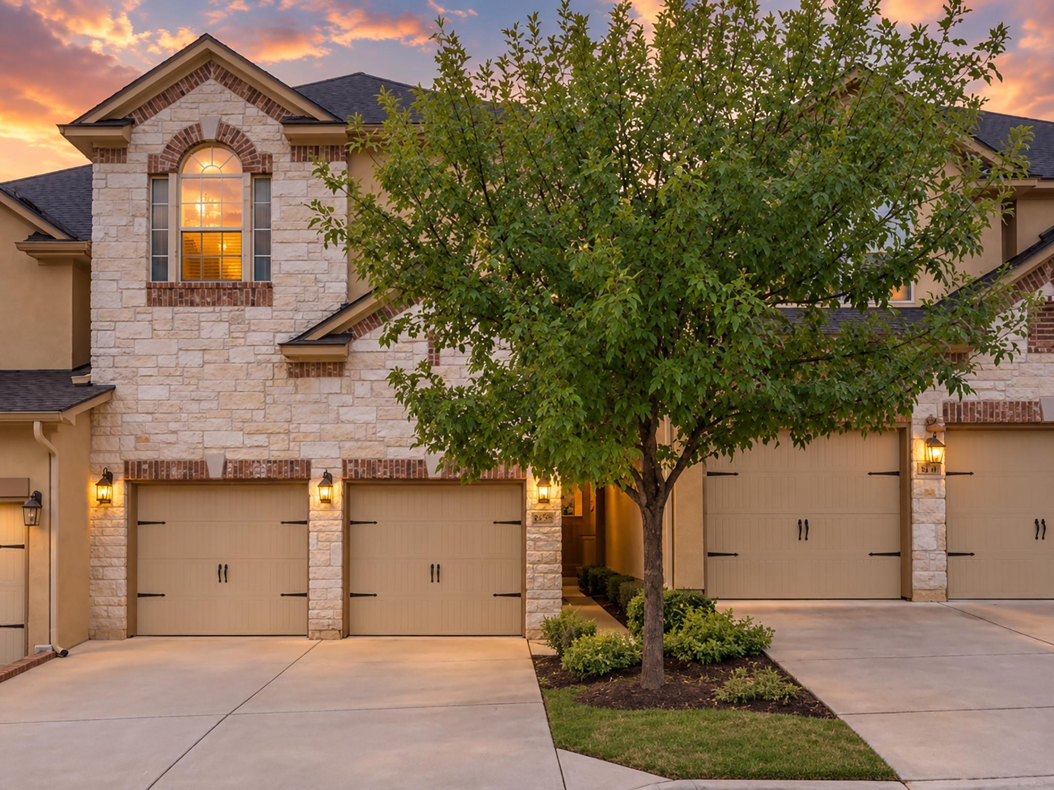 Elegant stone accents and arched windows frame a 