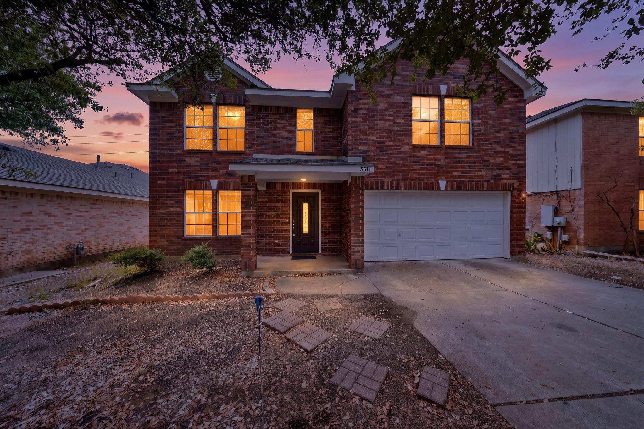 A classic brick exterior presents timeless curb a