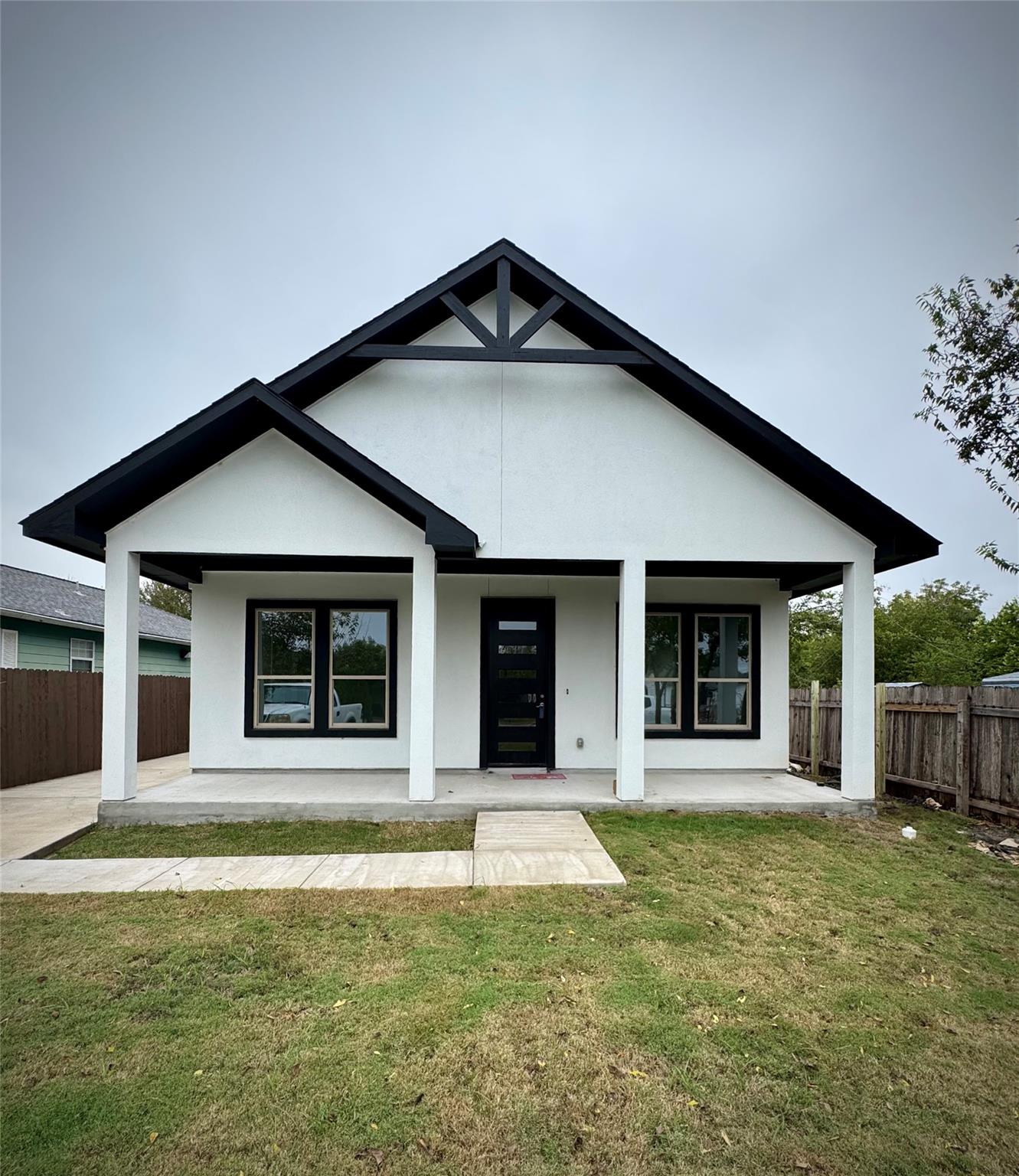 Striking architectural gables and a welcoming cov