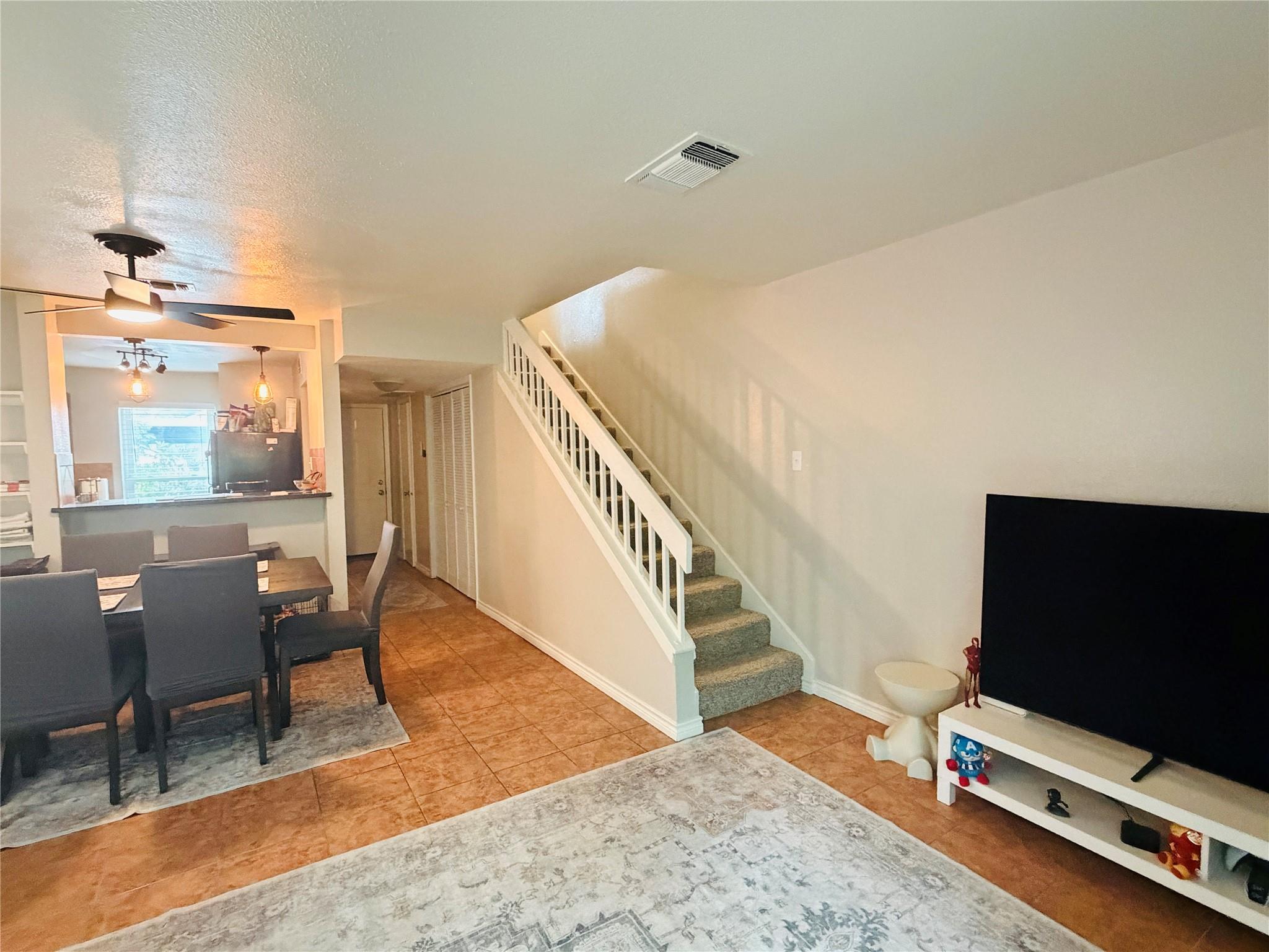 An open floorplan seamlessly connects the living 