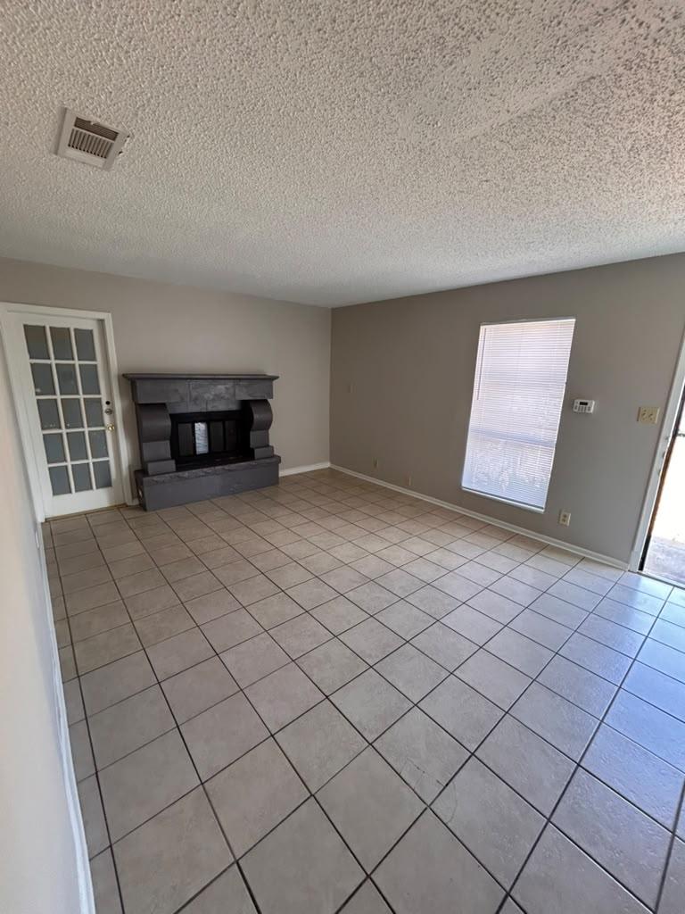 Tiled flooring anchors this living space accented
