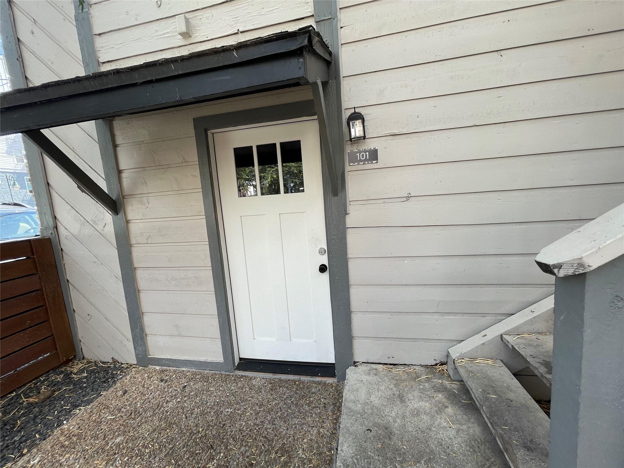 An inviting entrance with a classic paneled front