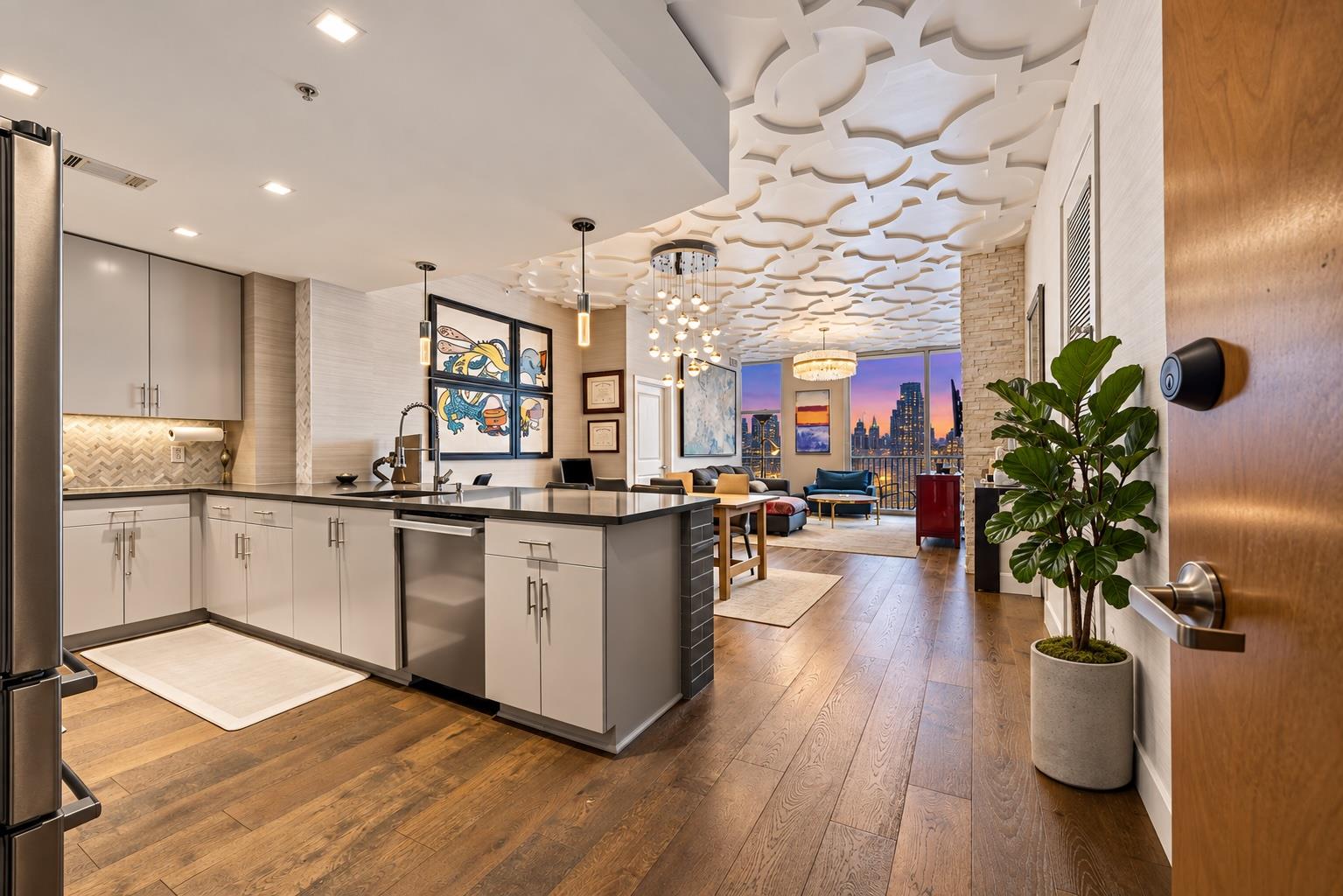 Rich hardwood floors anchor this open-concept lay