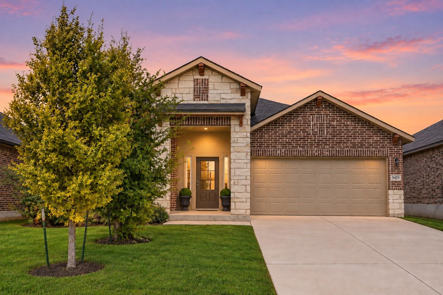 Stone and brick detailing highlights the front ex
