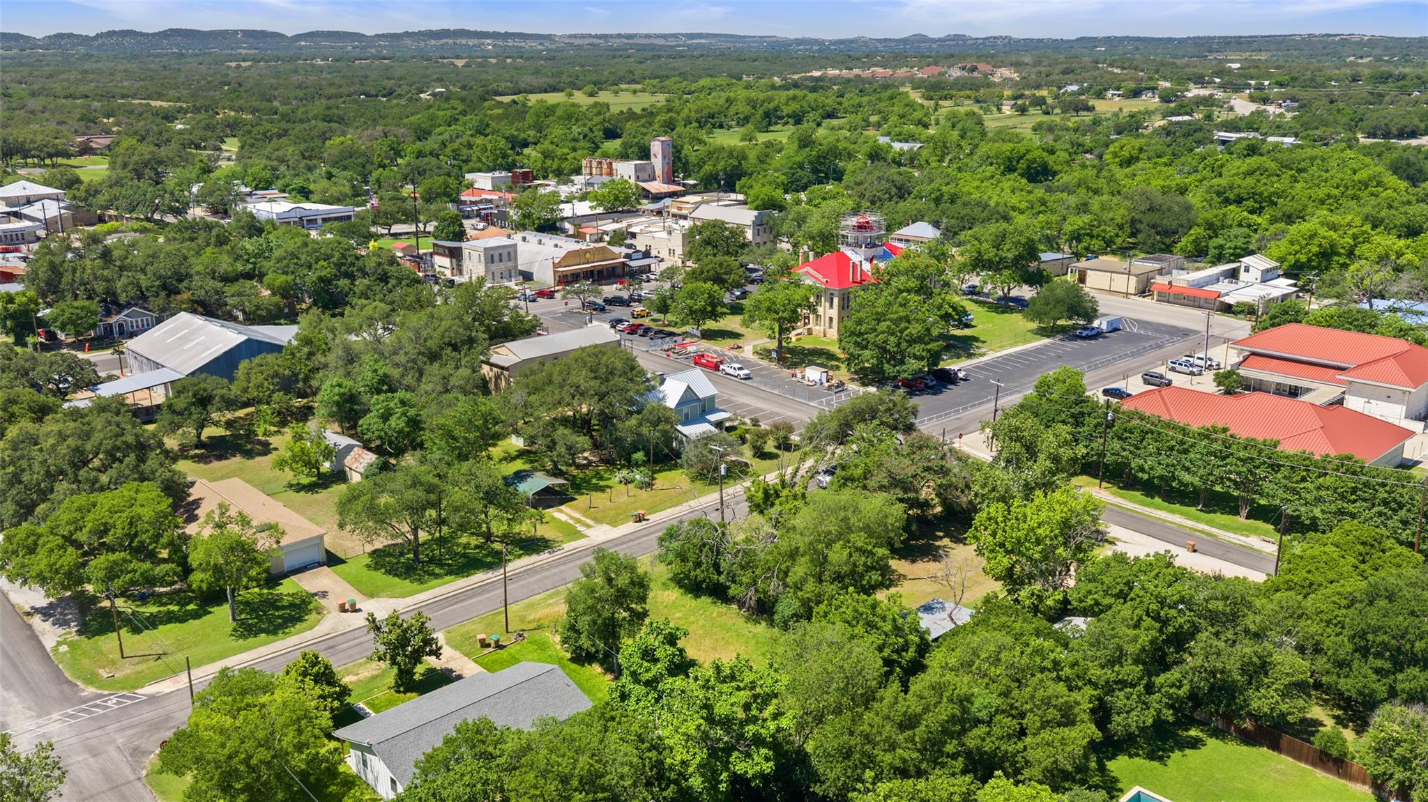 Rolling hills frame a peaceful small town neighbo