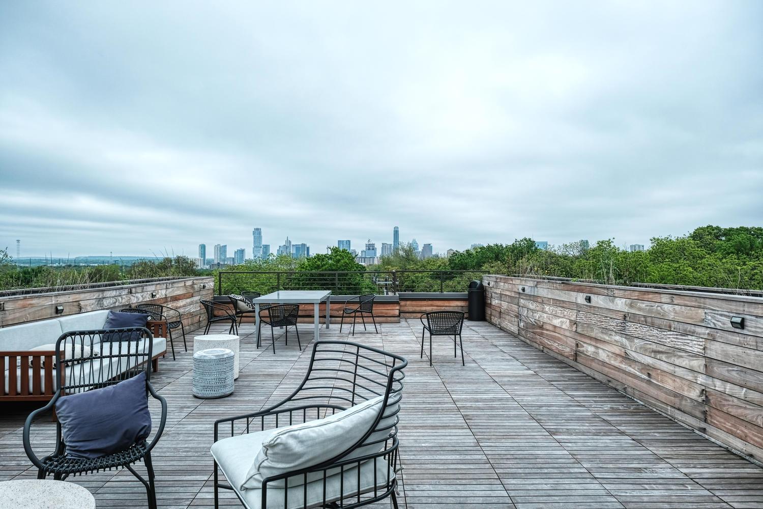 Panoramic downtown skyline views highlight this e