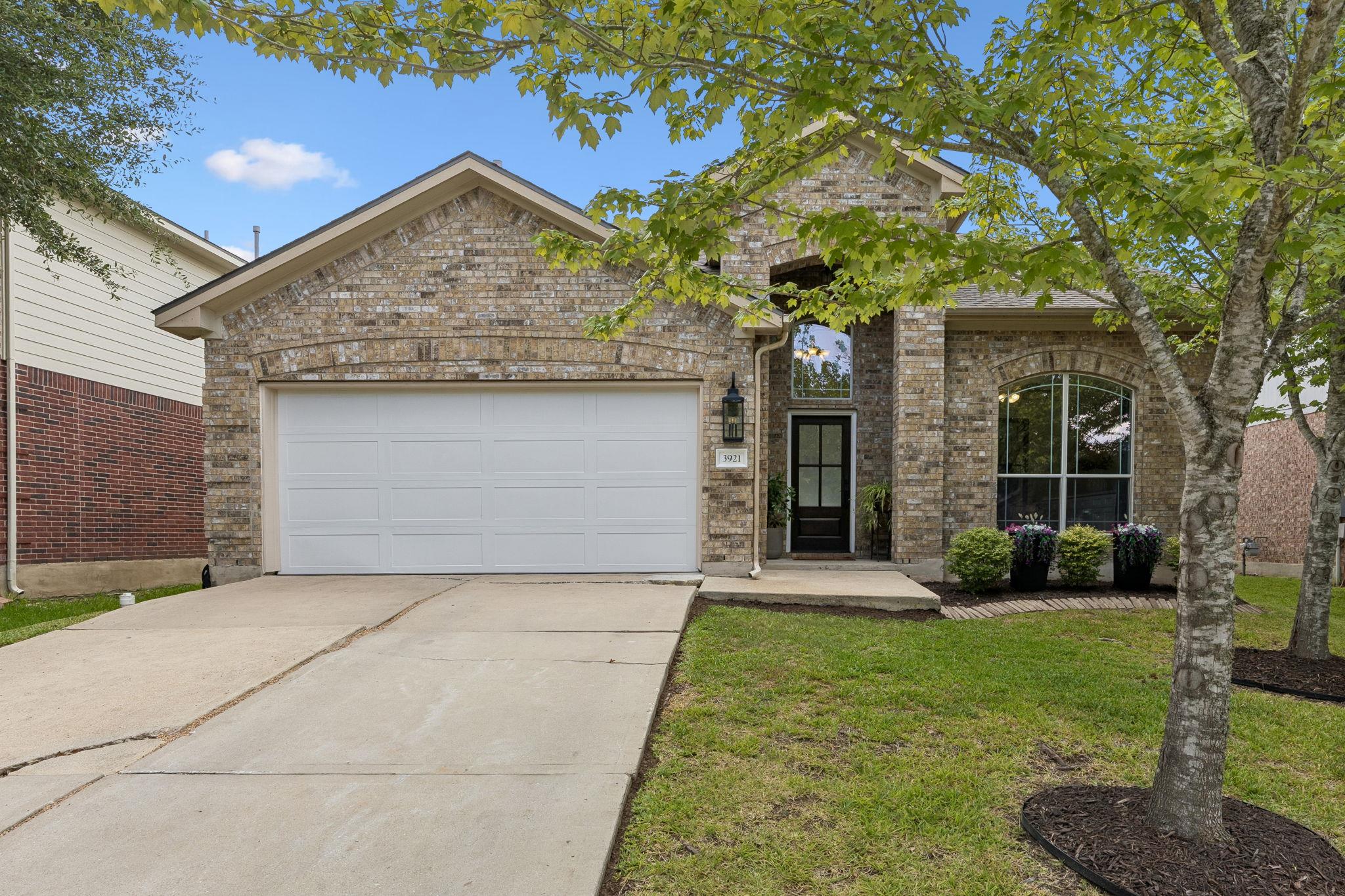 Classic brick elevation highlights this single-fa