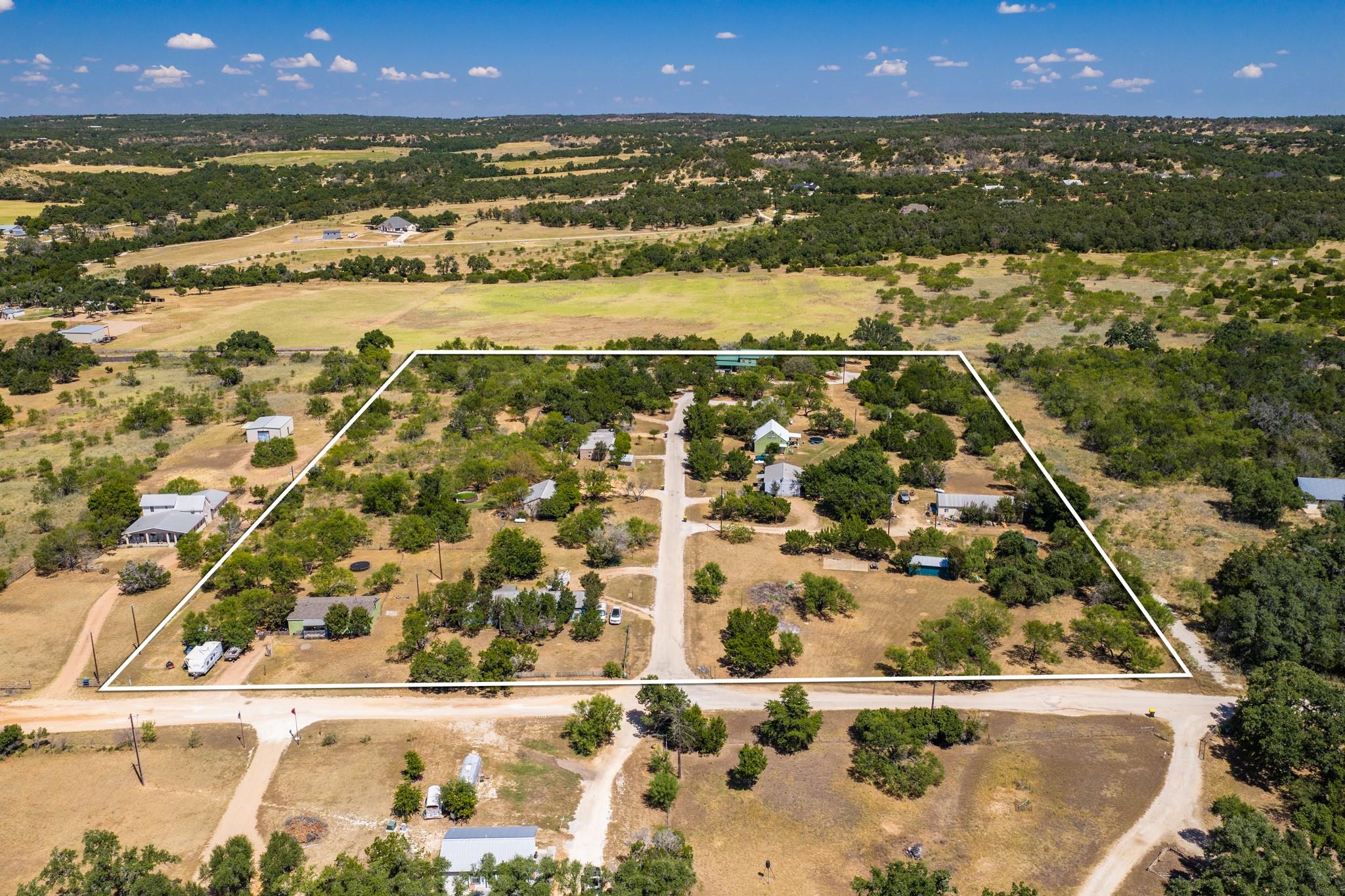 Mature trees and vast skies define this sprawling
