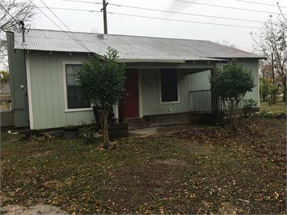 A covered front porch welcomes visitors to this c