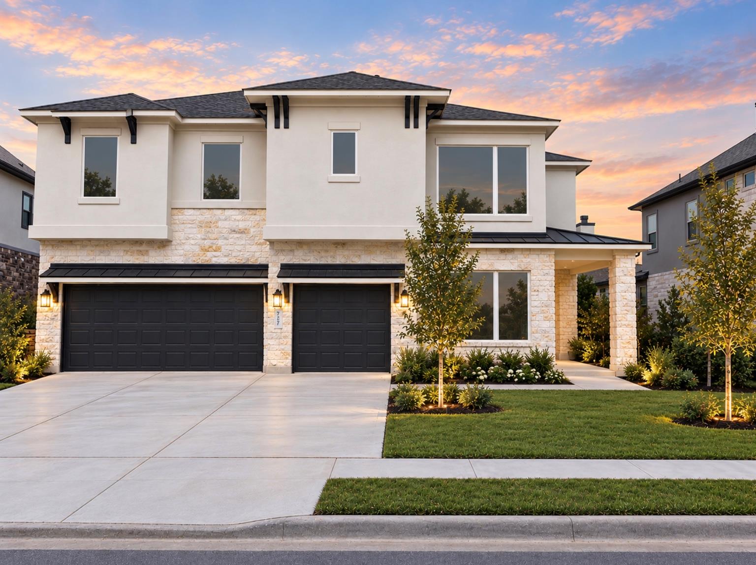 Crisp stucco and textured stone siding pair beaut