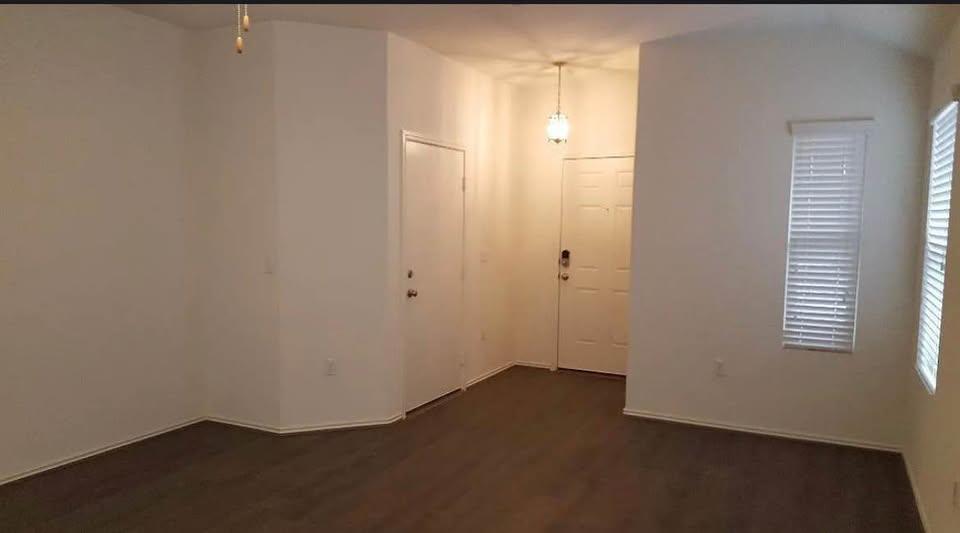 Smooth wood floors anchor this versatile living s