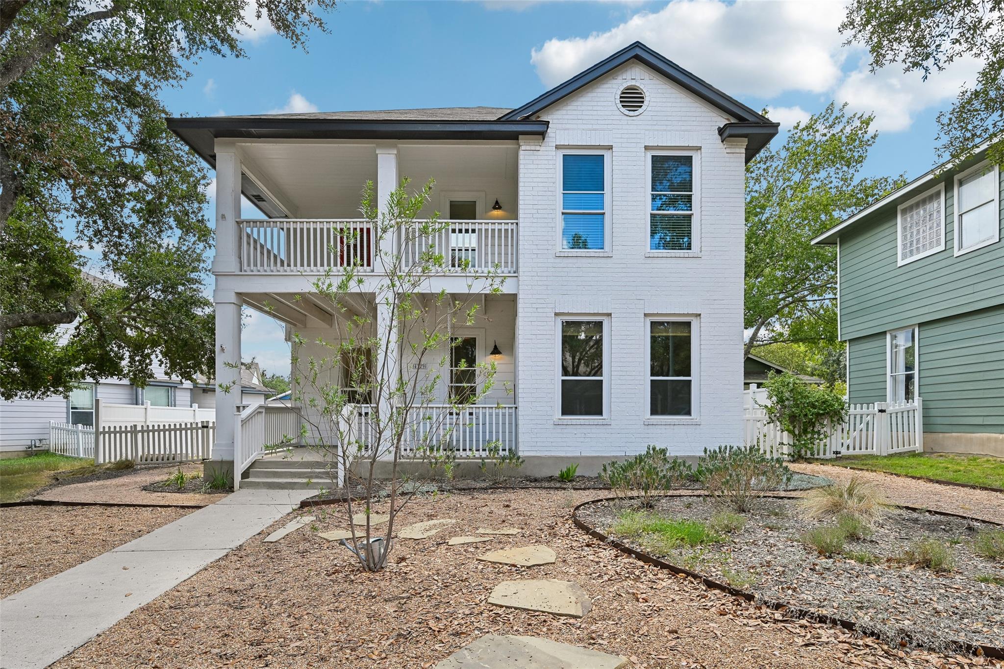 Double-decker porches and classic white brickwork