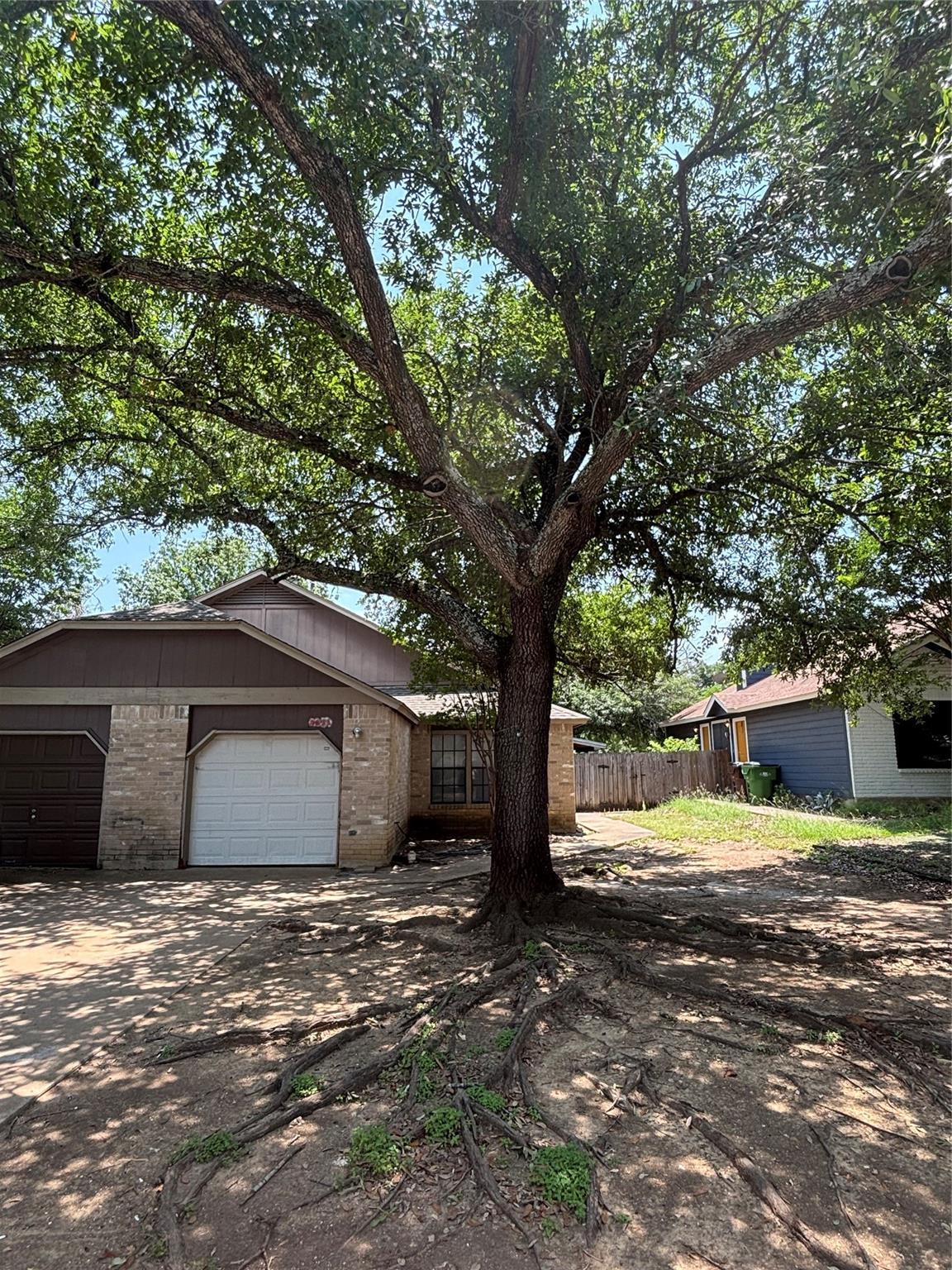 Shade trees mature beautifully beside a classic b