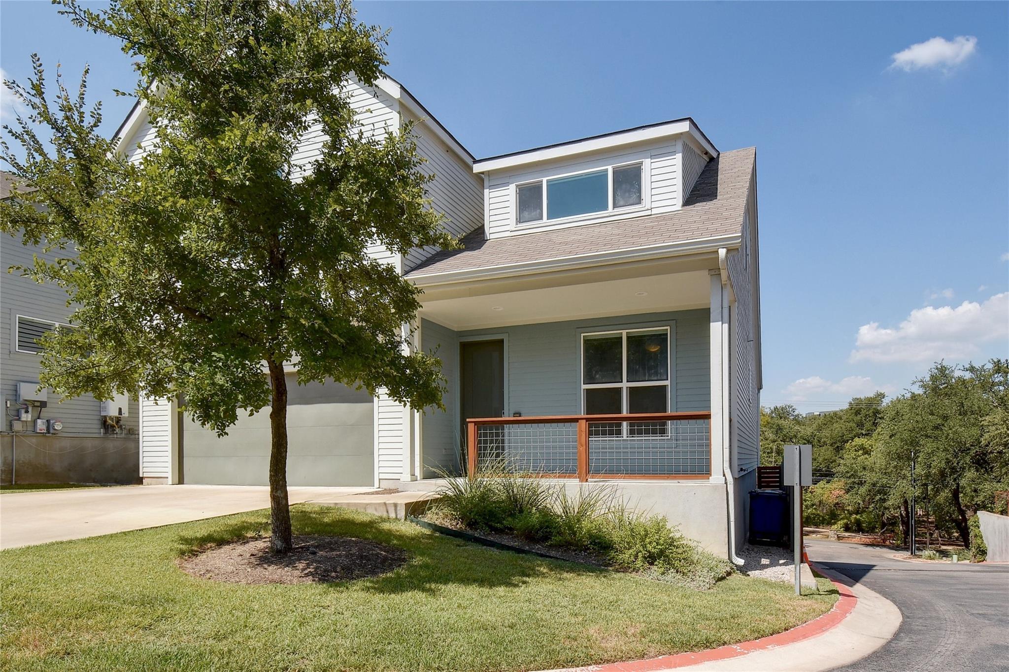 A classic front elevation features clean siding, 