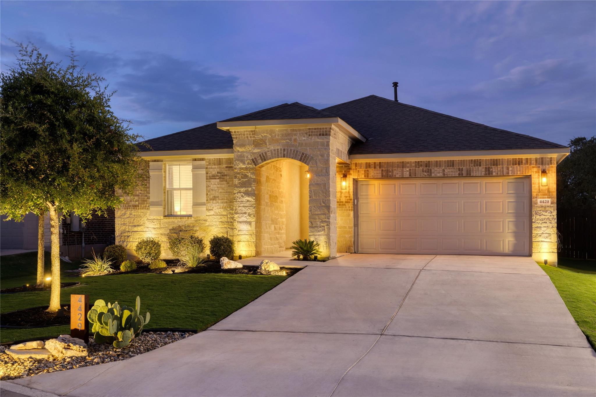 A stone-and-brick facade highlights this modern o
