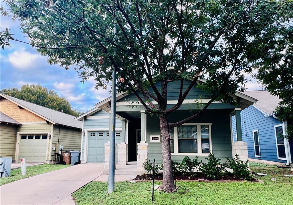 A welcoming front porch leads into this charming 
