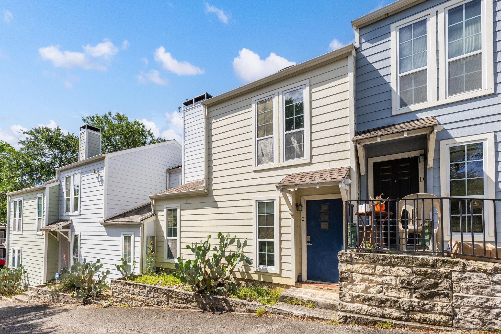 Multi-level townhouse units feature classic sidin