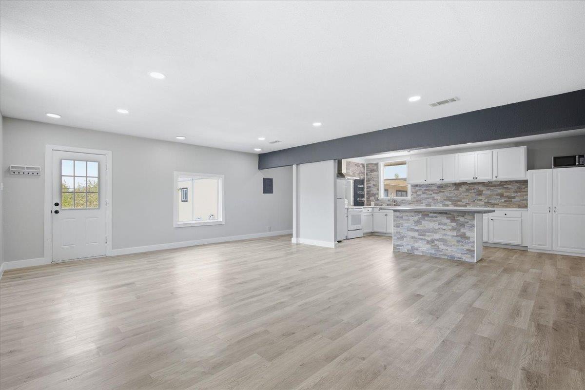 An open-concept living area connects seamlessly t