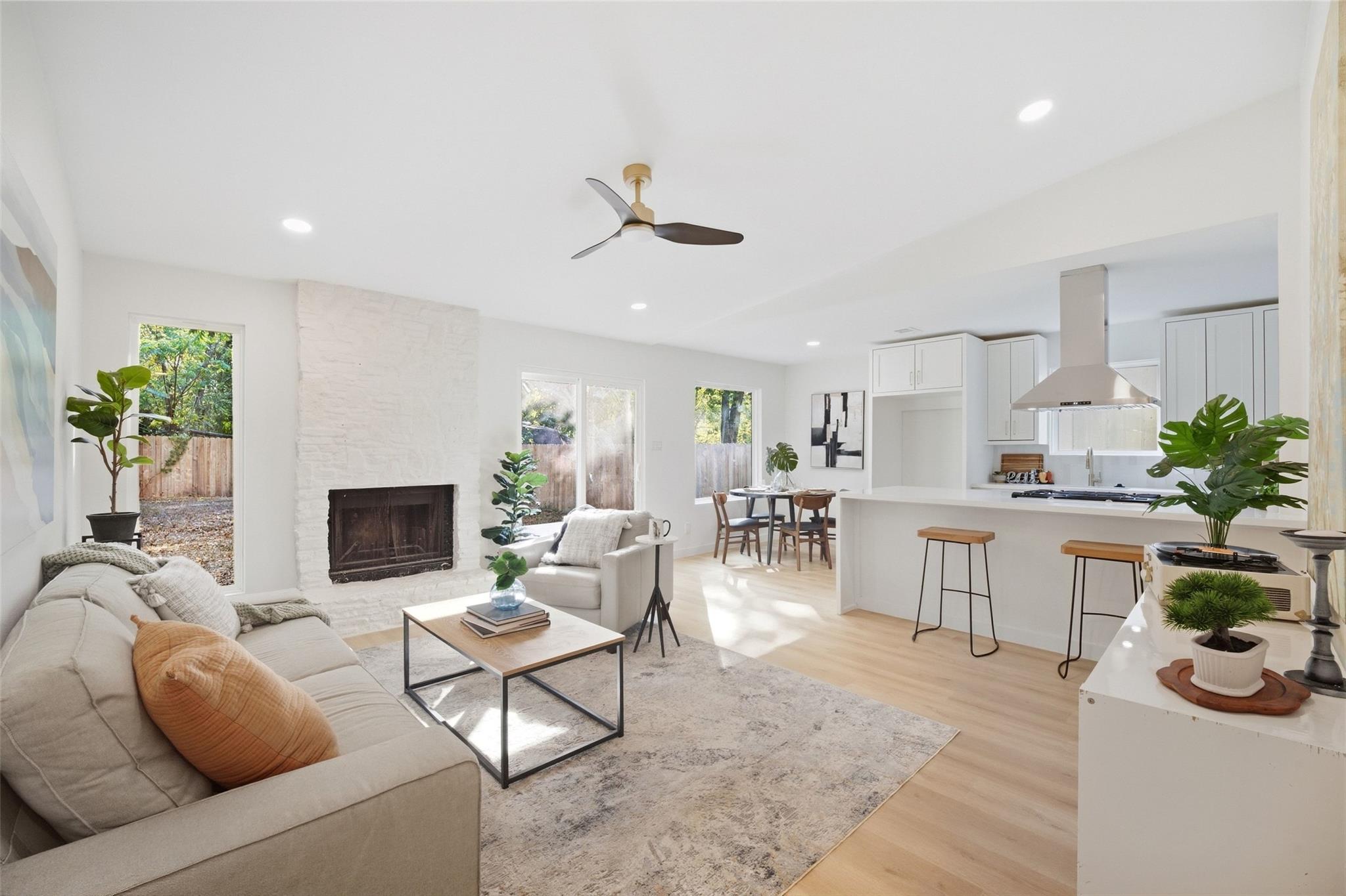 An open floorplan seamlessly connects the living 