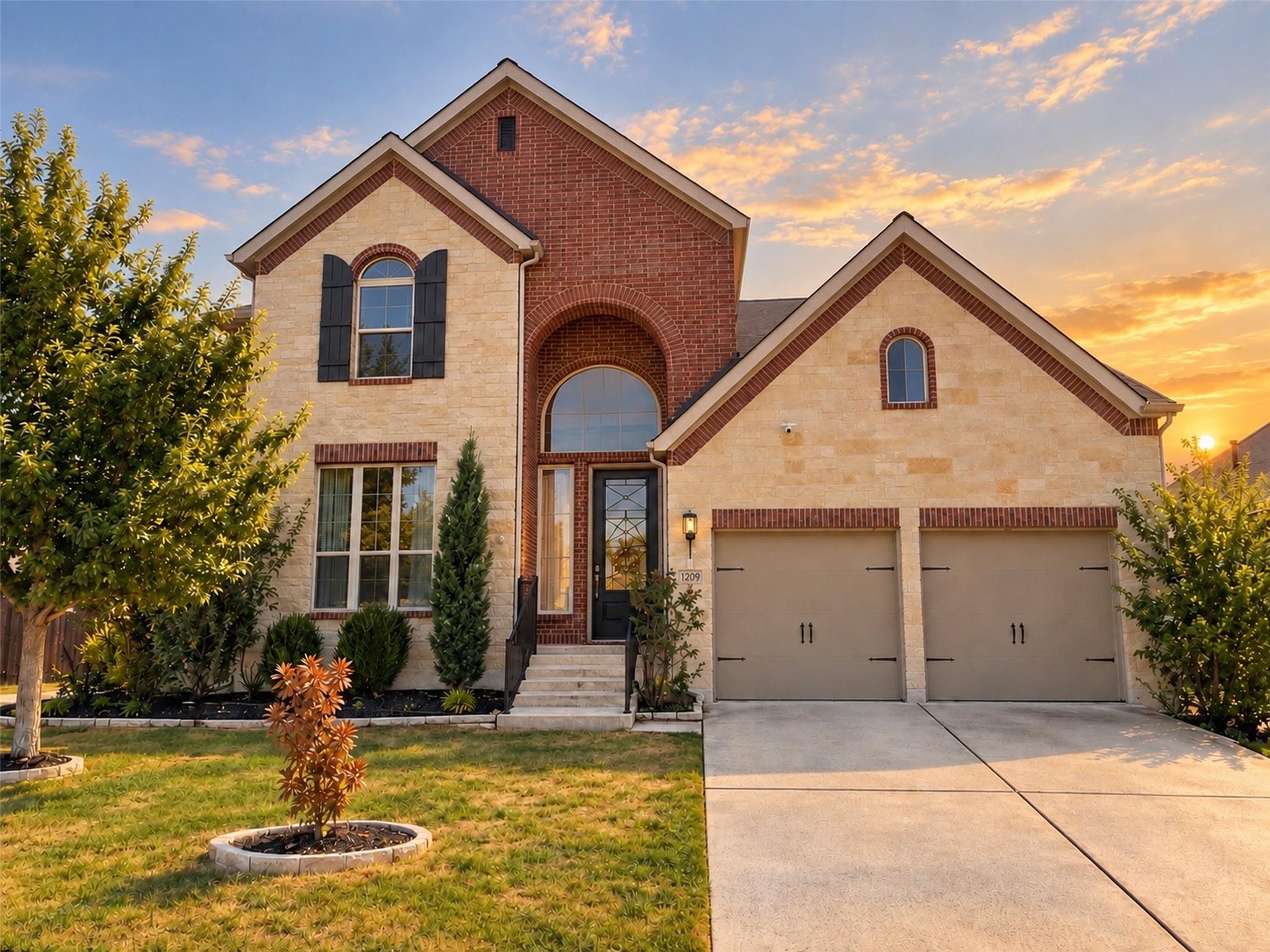 A classic brick and stone facade frames the grand