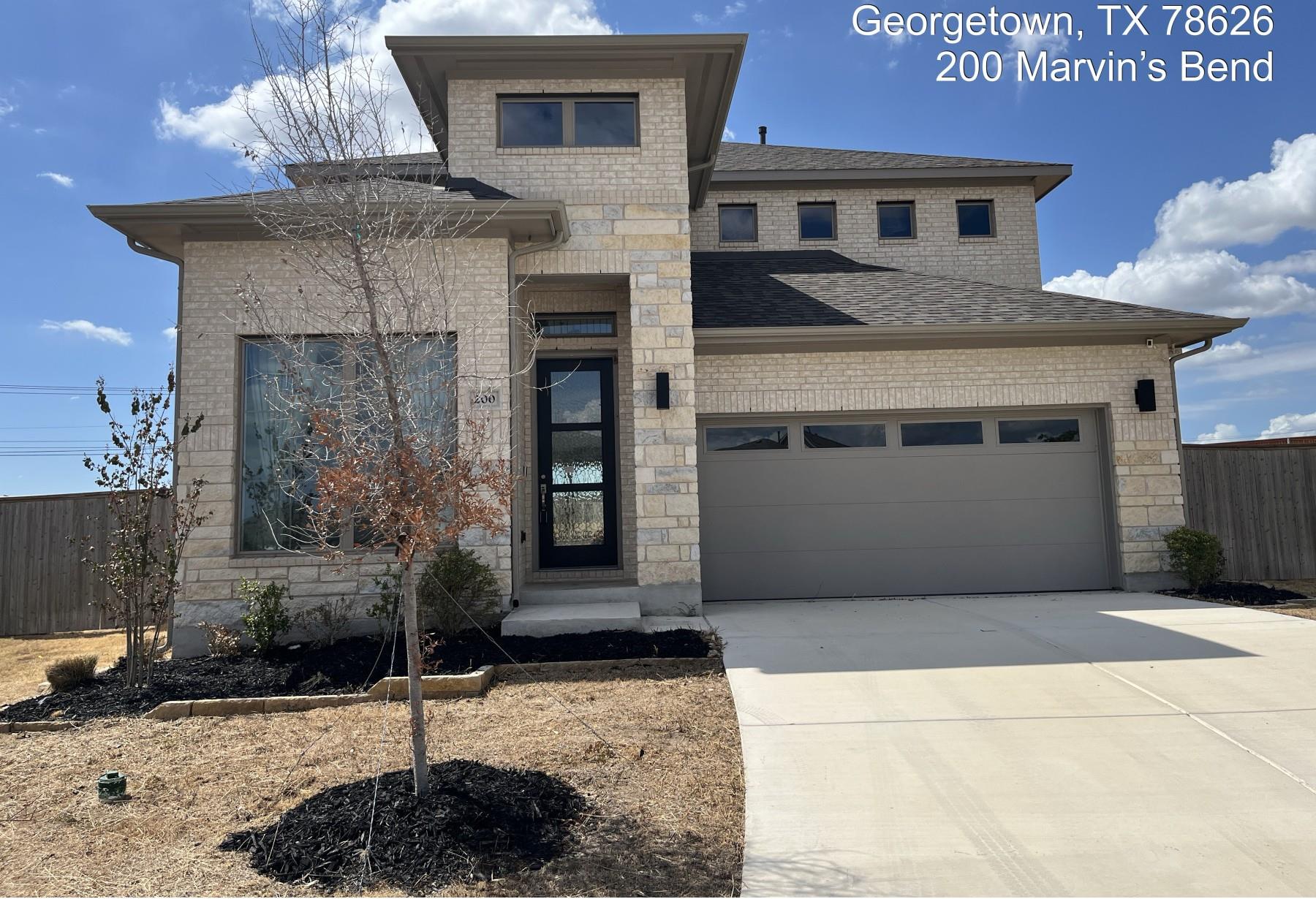 An elegant stone exterior is enhanced by clean ar