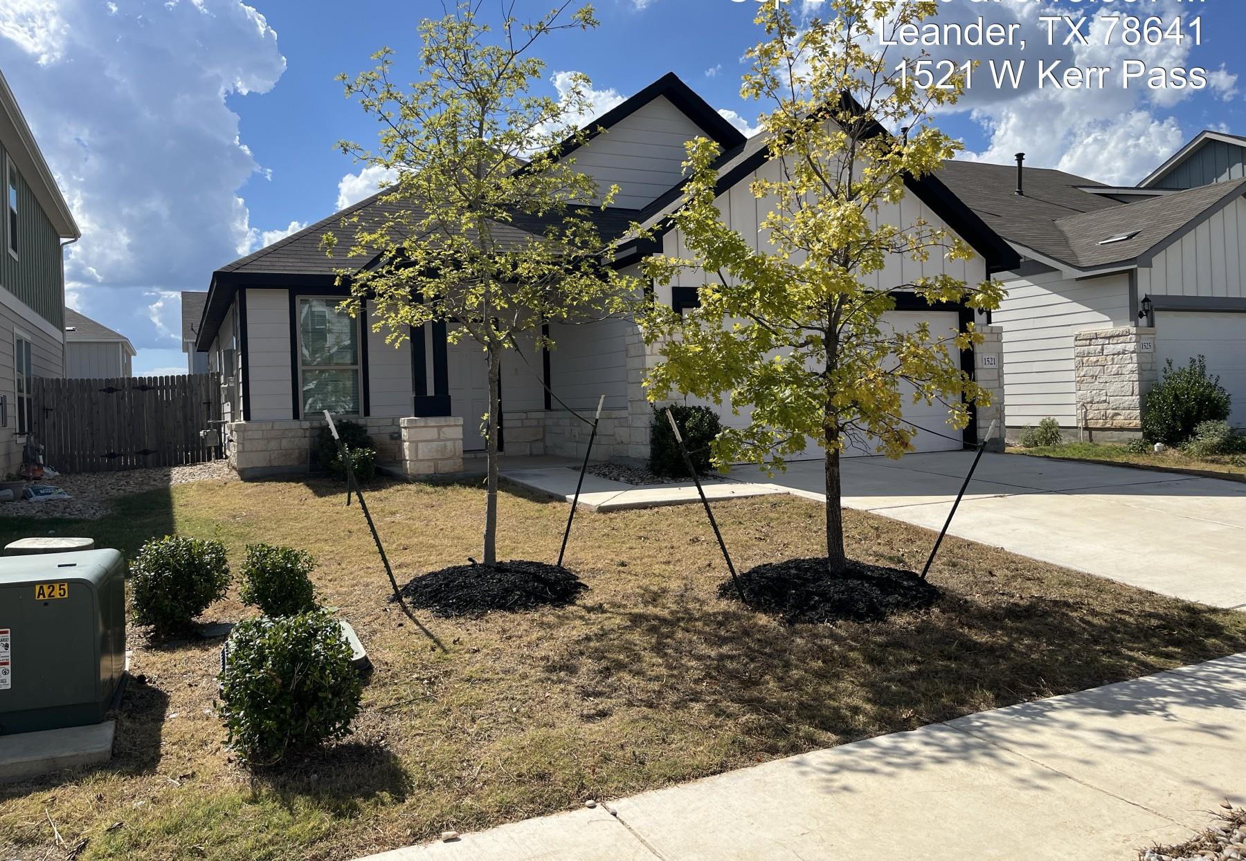 Crisp white siding meets dark trim on this contem