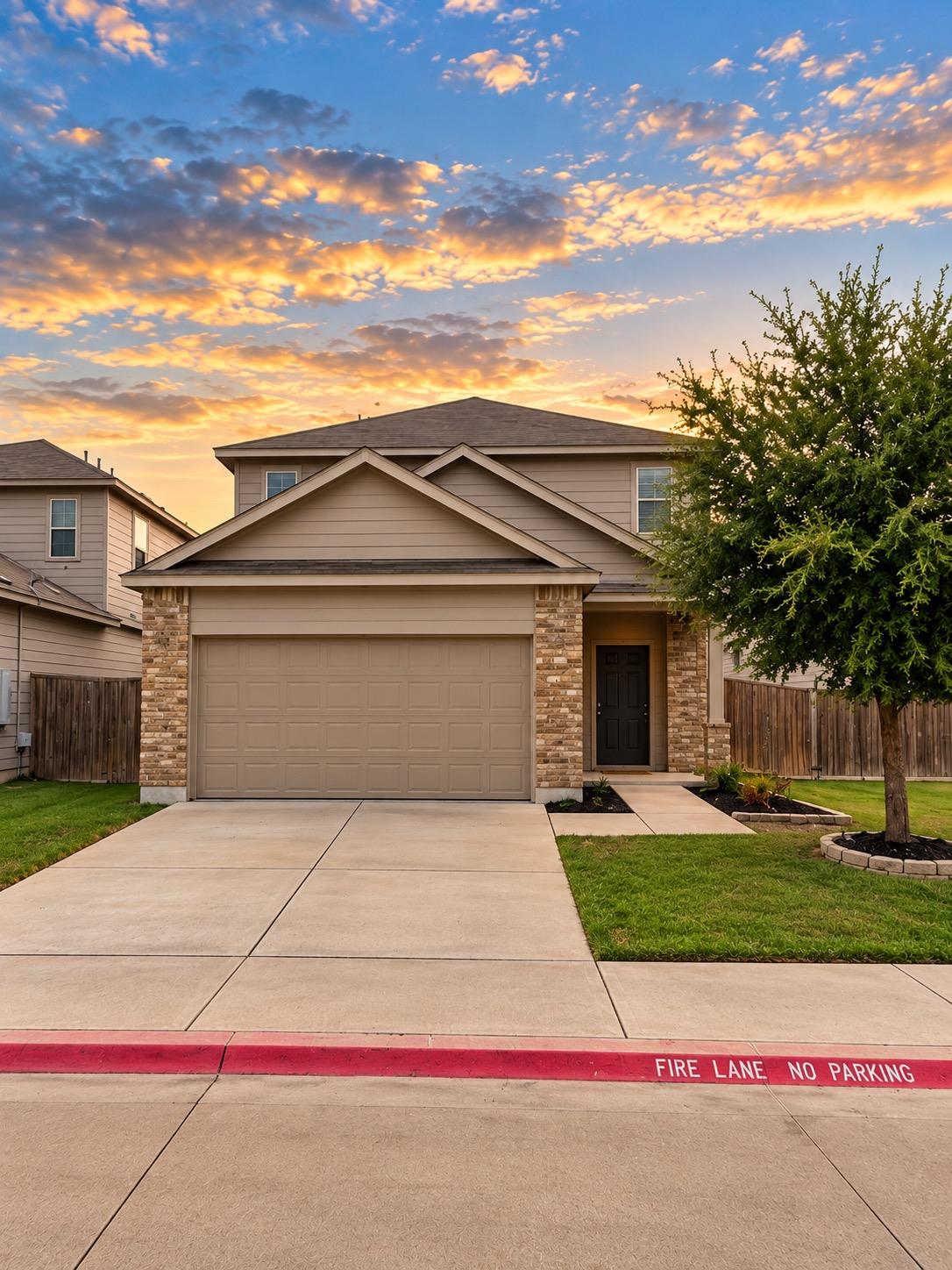 A classic two-story exterior features a neutral c