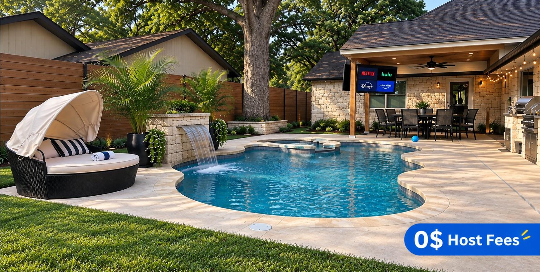 A sparkling in-ground pool anchored by a stone wa