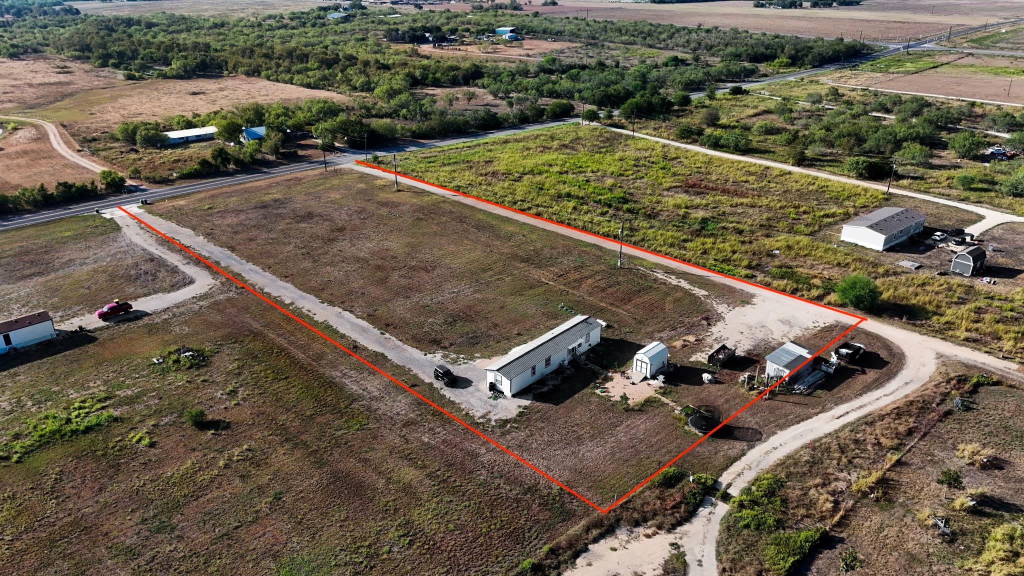 An aerial perspective reveals a vast acreage prop