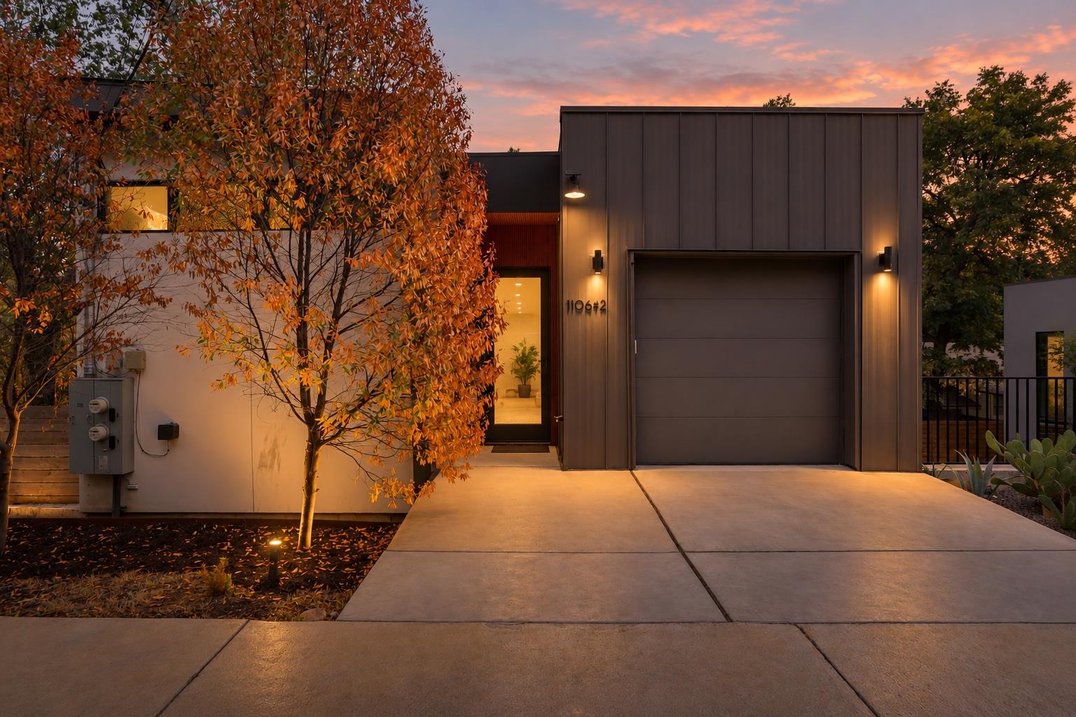 Warm exterior lighting illuminates the clean line