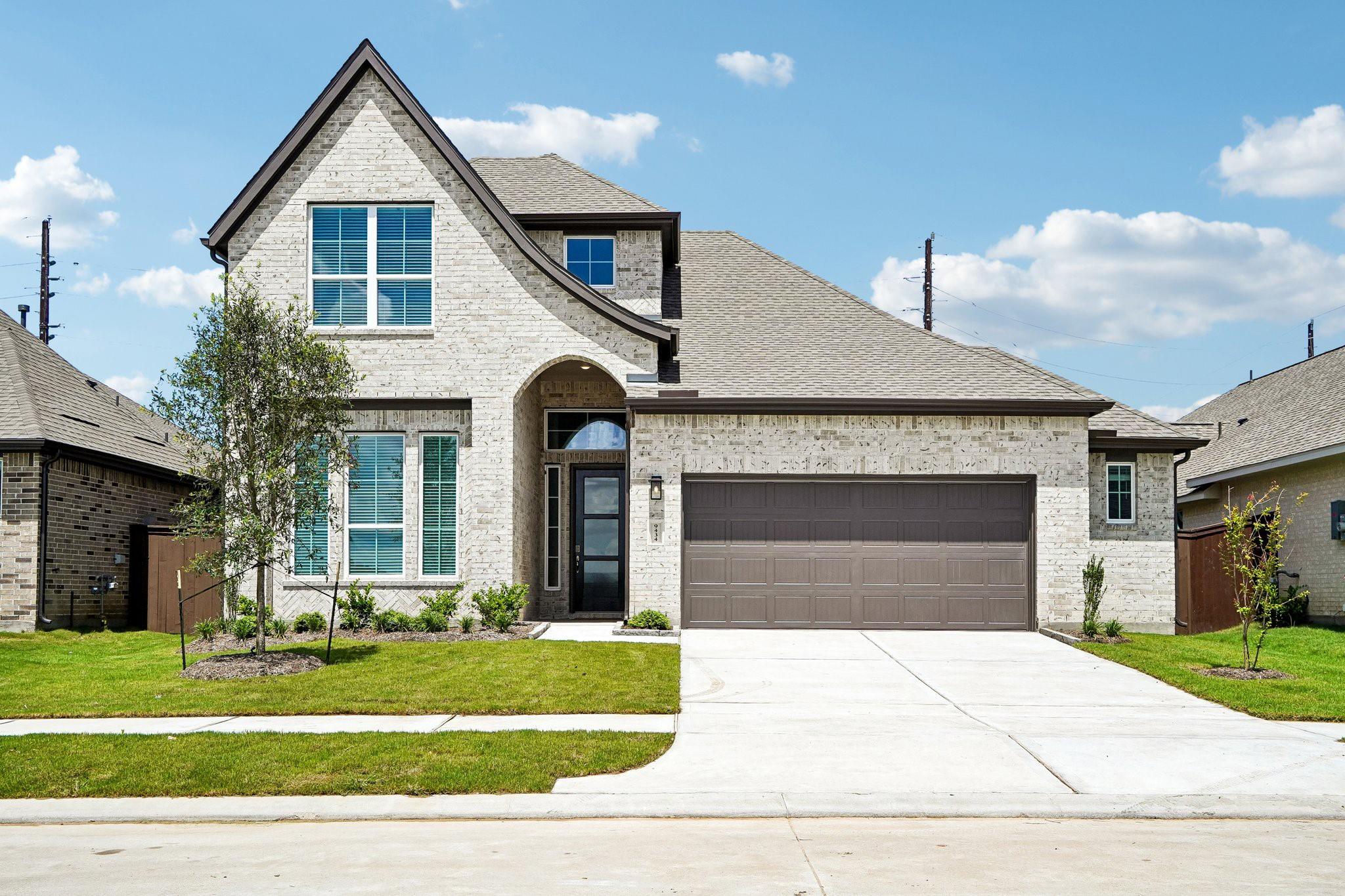 An elegant brick facade pairs with a clean concre