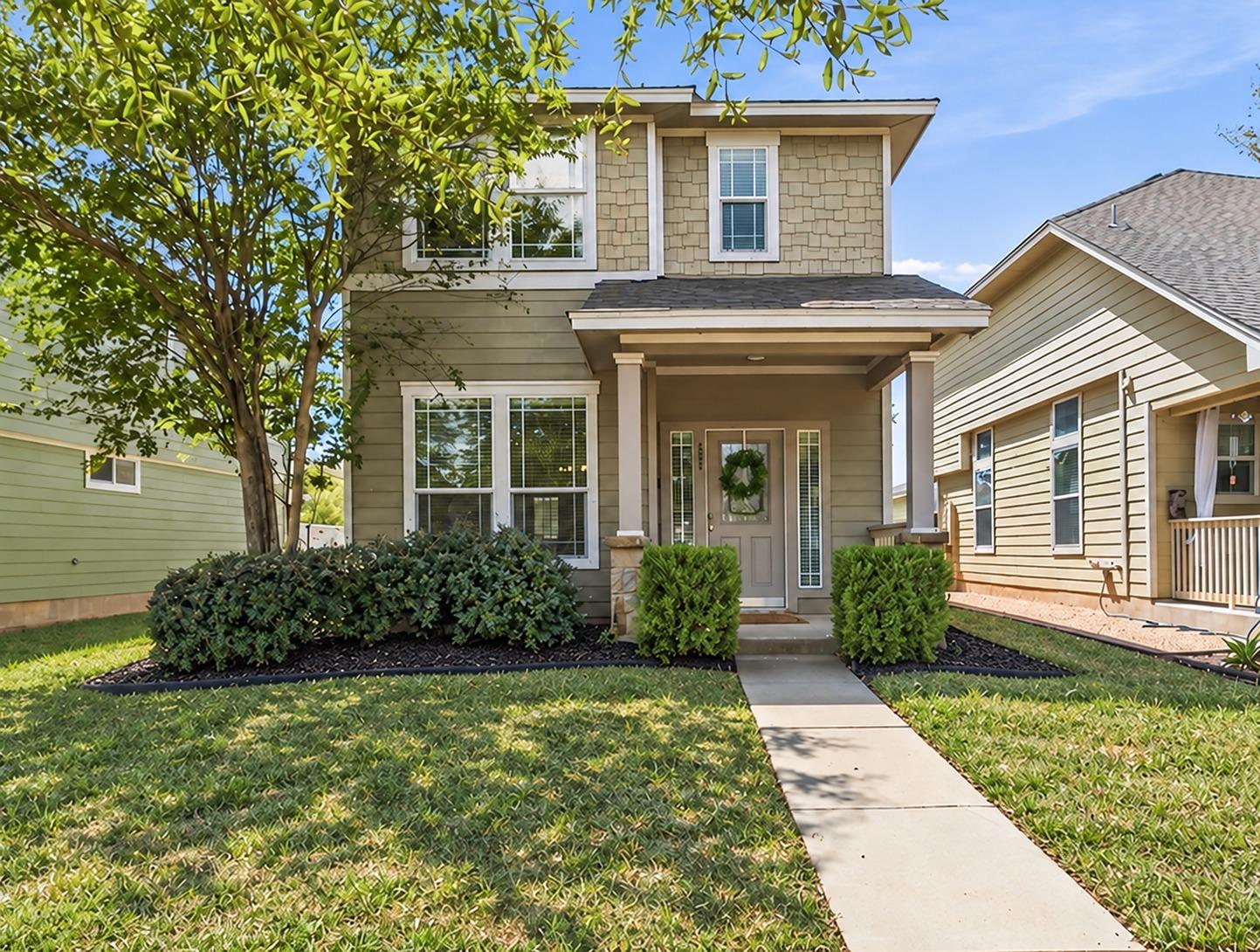 An inviting front porch and classic siding detail
