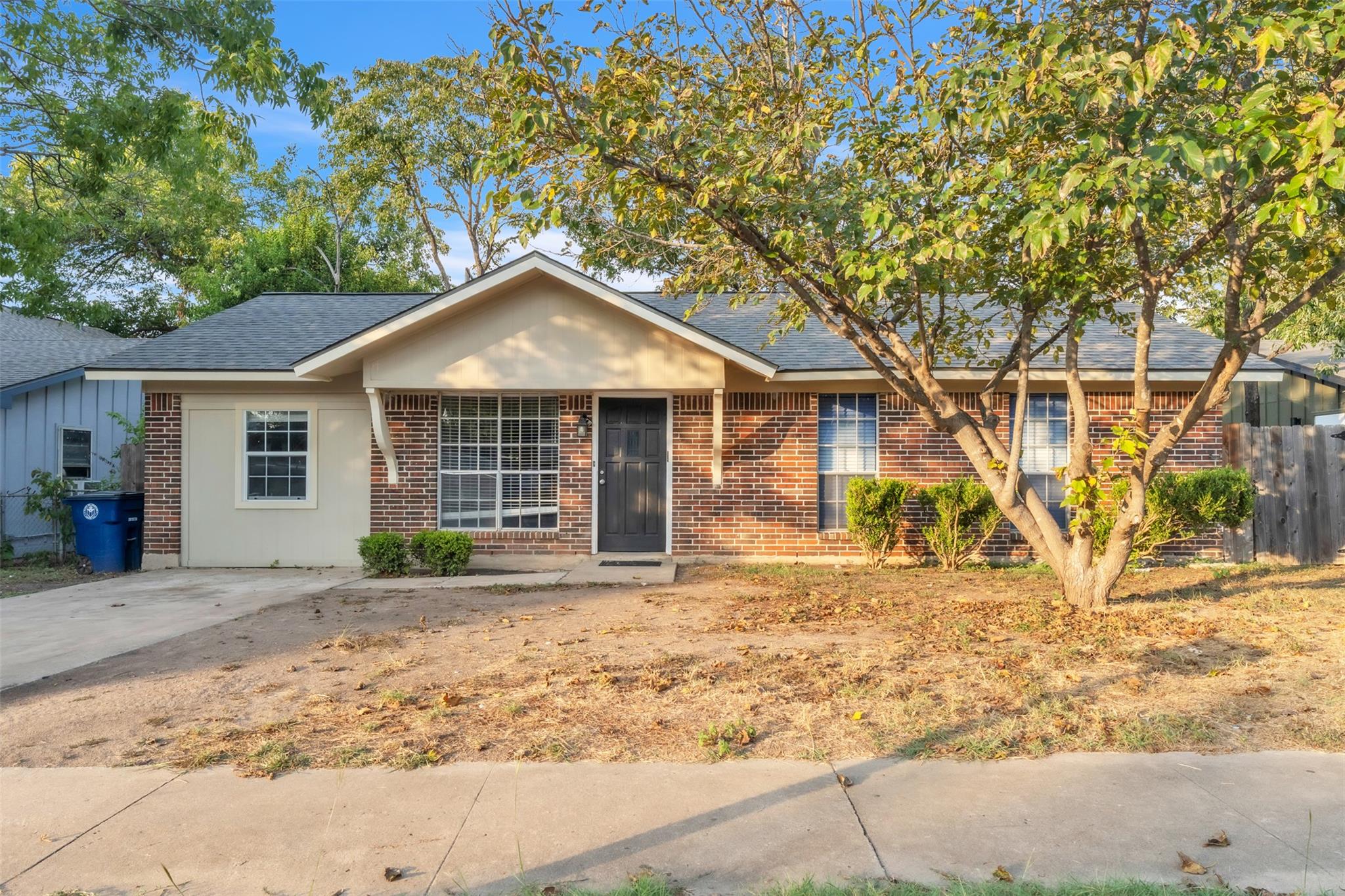 Classic brick exterior accents this single-story 